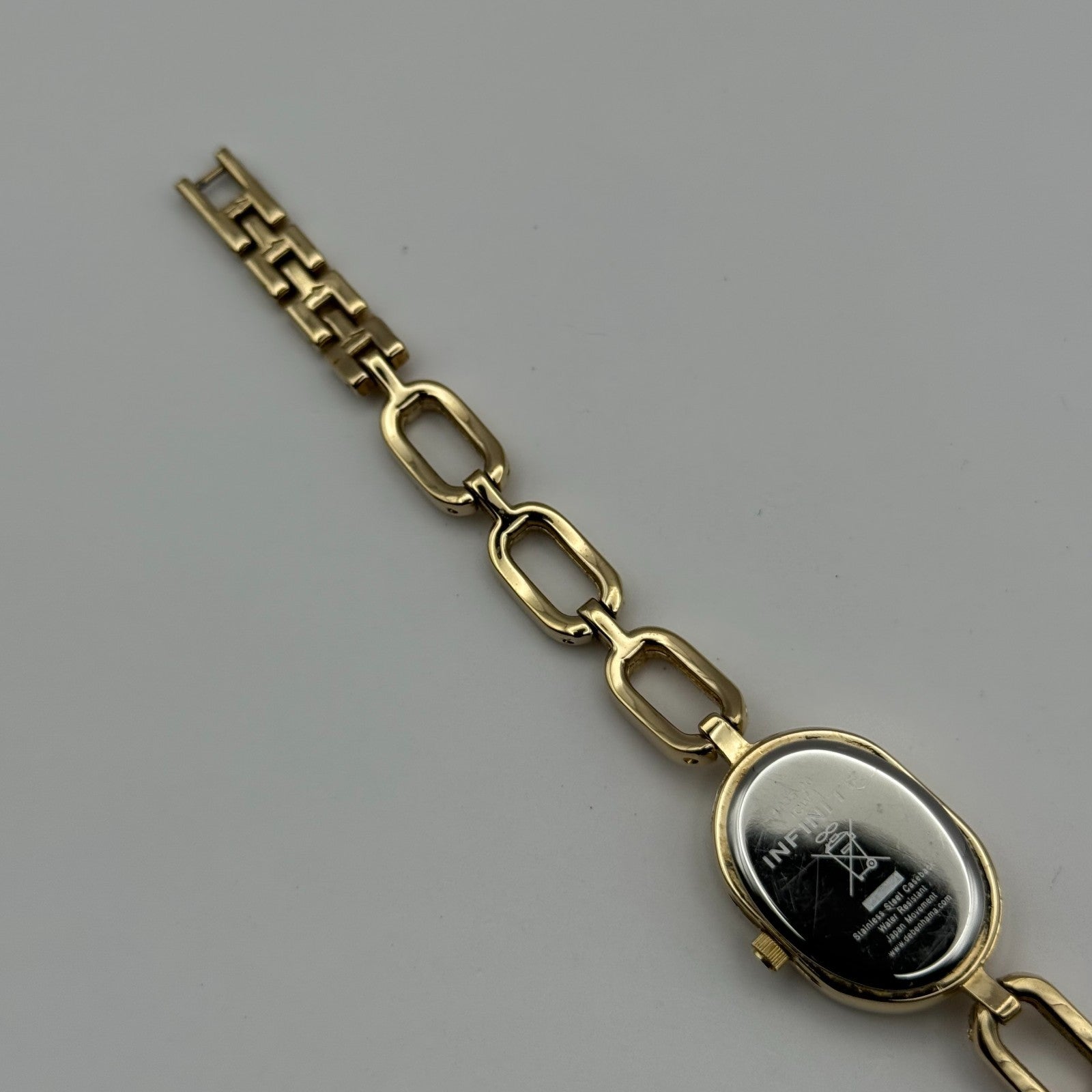 Infinite Ladies Quartz Watch Oval Dial Gold Tone Bracelet Japan Working 19mm