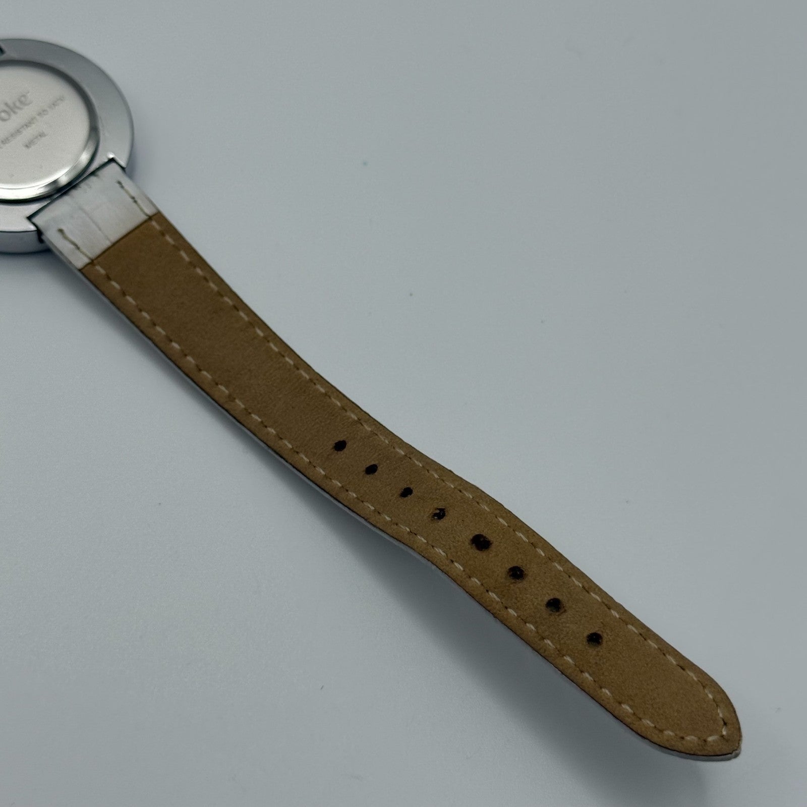 Evoke Ladies Quartz Watch Silver Dial Glitter Bezel White Strap Working 30mm