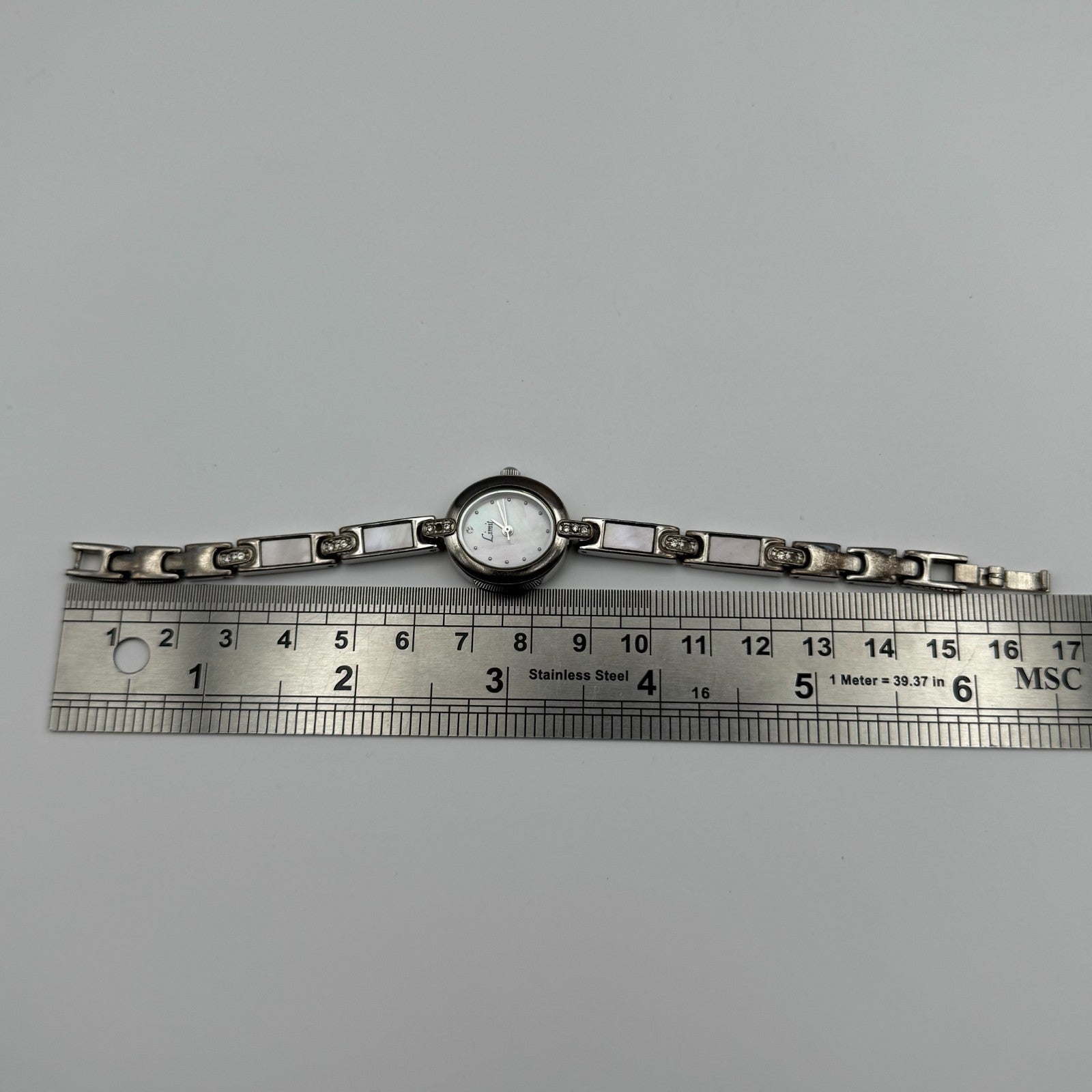 Limit Ladies Quartz Watch Pink MOP Dial Silver Tone Bracelet Working 19mm