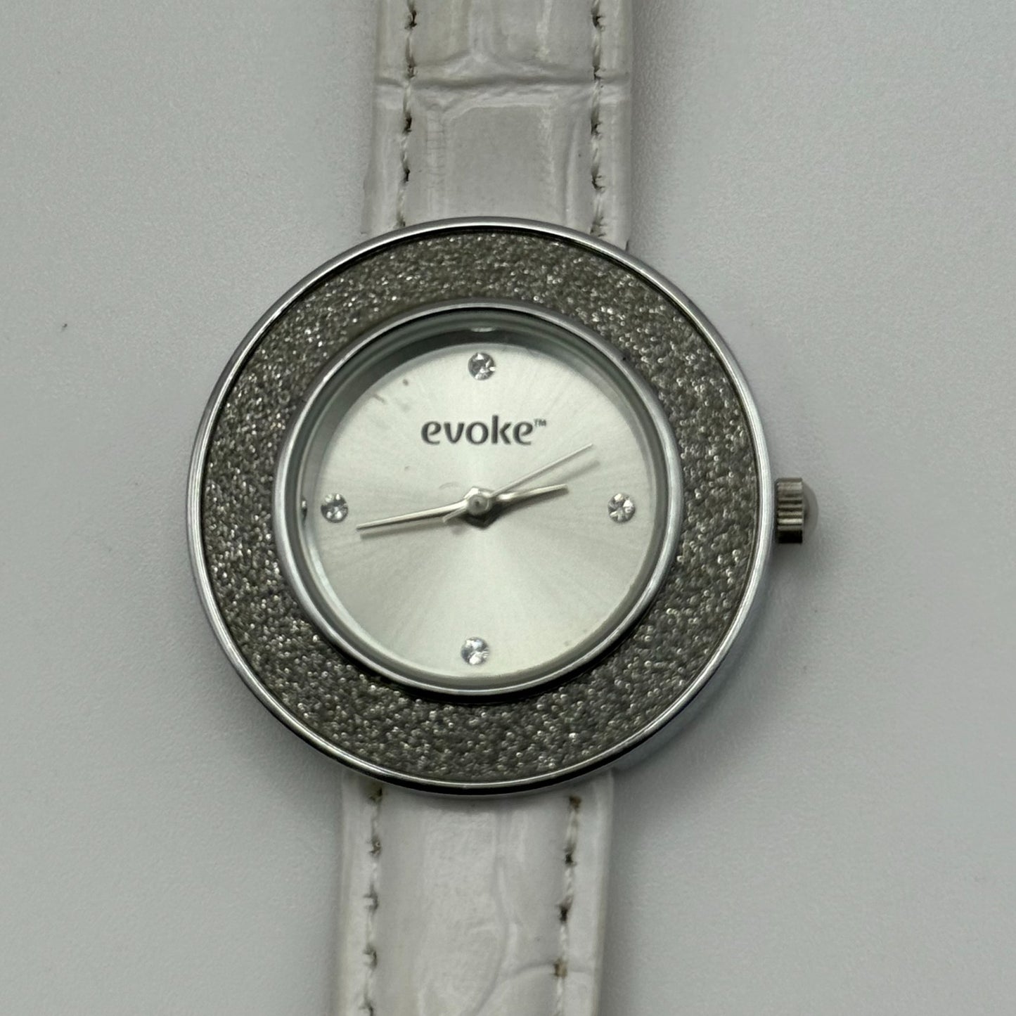 Evoke Ladies Quartz Watch Silver Dial Glitter Bezel White Strap Working 30mm