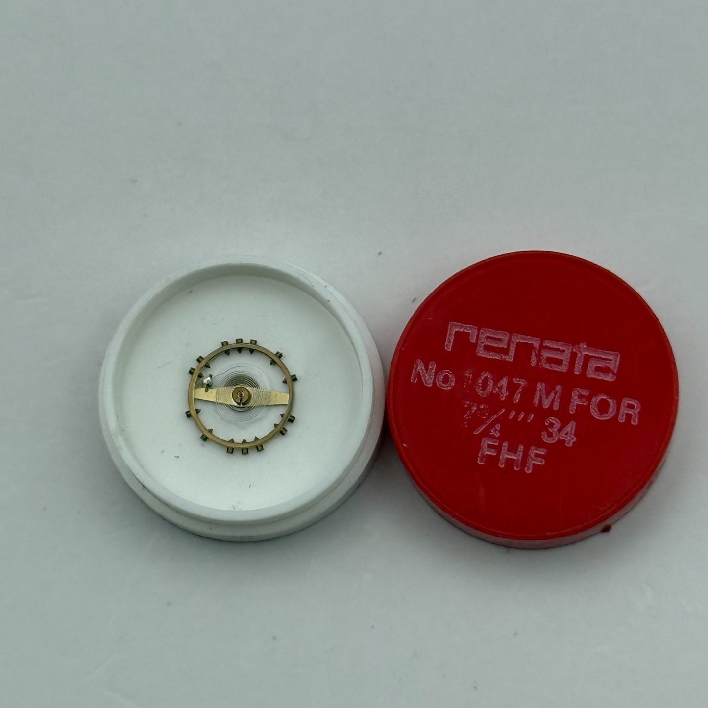 FHF 34 Balance Wheel Complete And Spring  7¾’’’ 1047 M Watch Movement Parts NOS