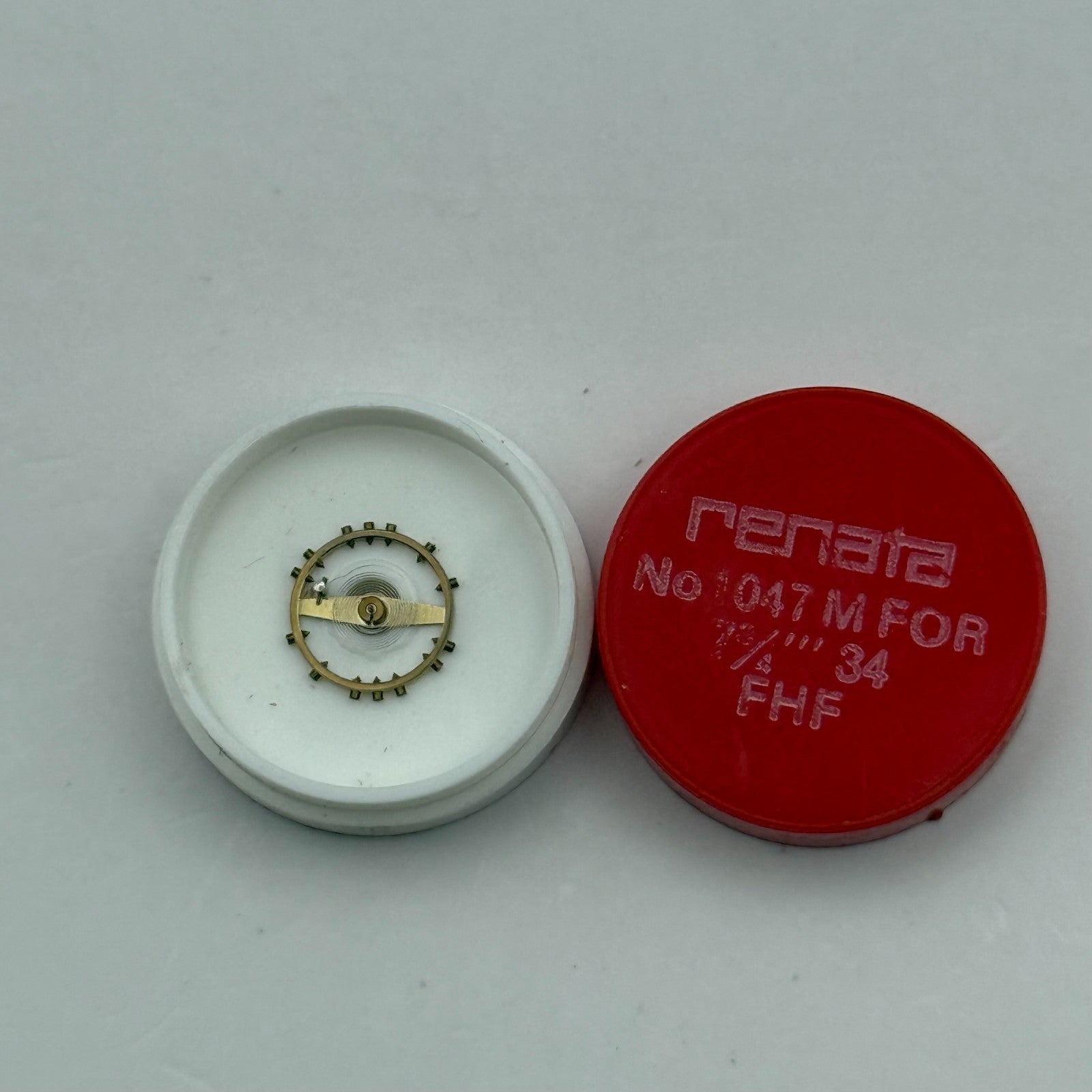 FHF 34 Balance Wheel Complete And Spring  7¾’’’ 1047 M Watch Movement Parts NOS