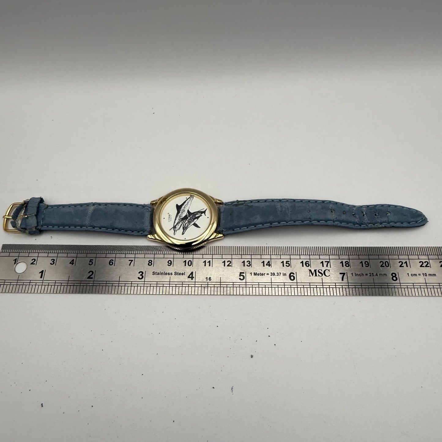 Citron Ladies Quartz Watch Dolphin Dial Gold Tone Blue Strap Working 35mm