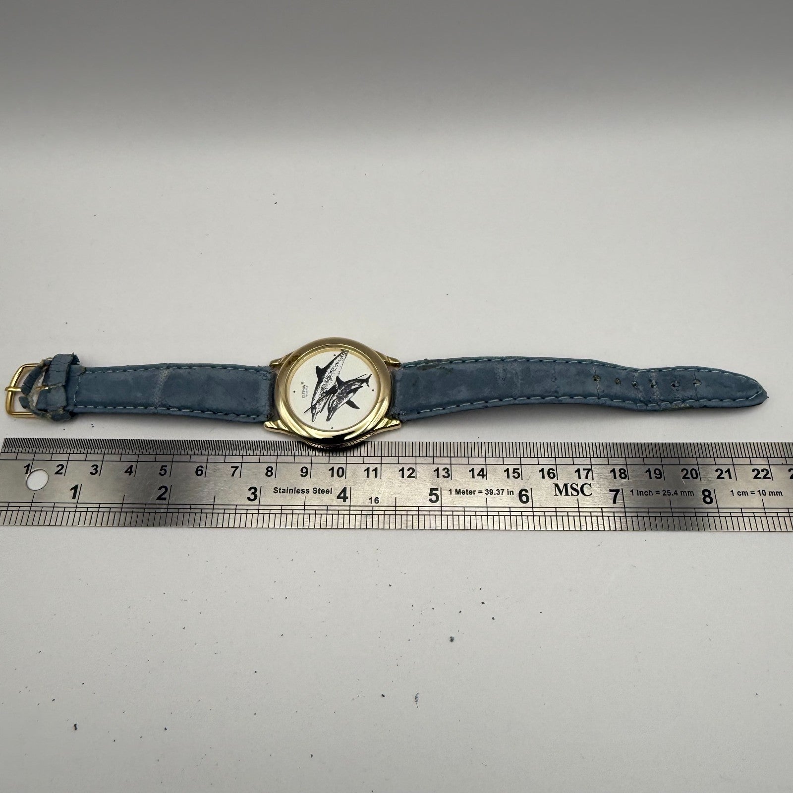 Citron Ladies Quartz Watch Dolphin Dial Gold Tone Blue Strap Working 35mm