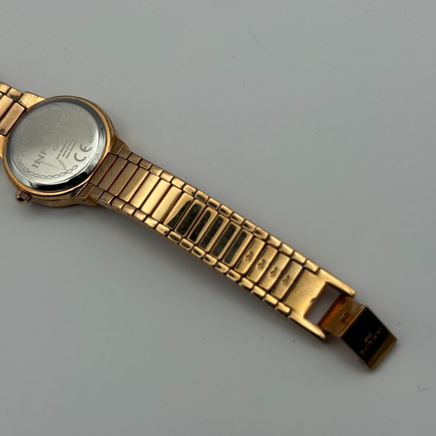 Infinite Ladies Quartz Watch Gold Tone Crystal Accents Bracelet Working 25mm