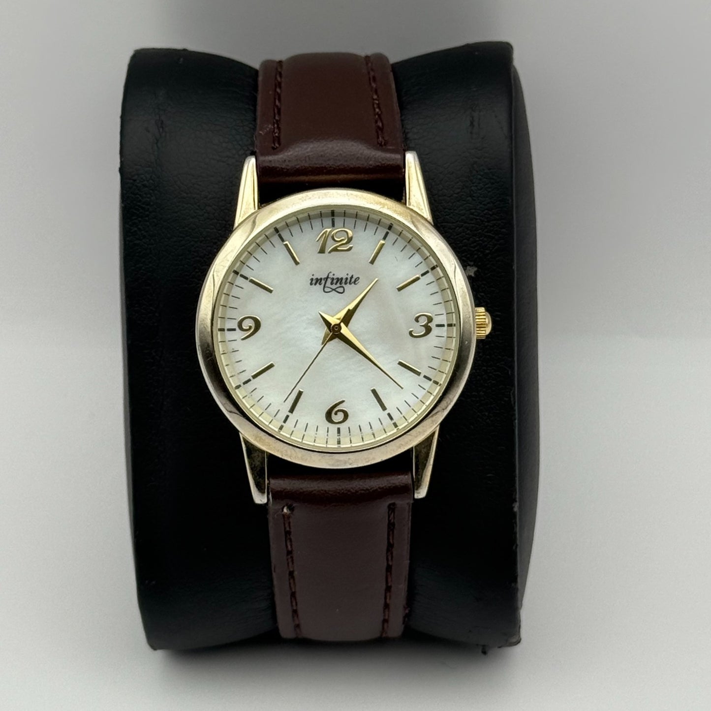 Infinite Ladies Quartz Watch Mother of Pearl Dial Brown Strap Japan Working 31mm