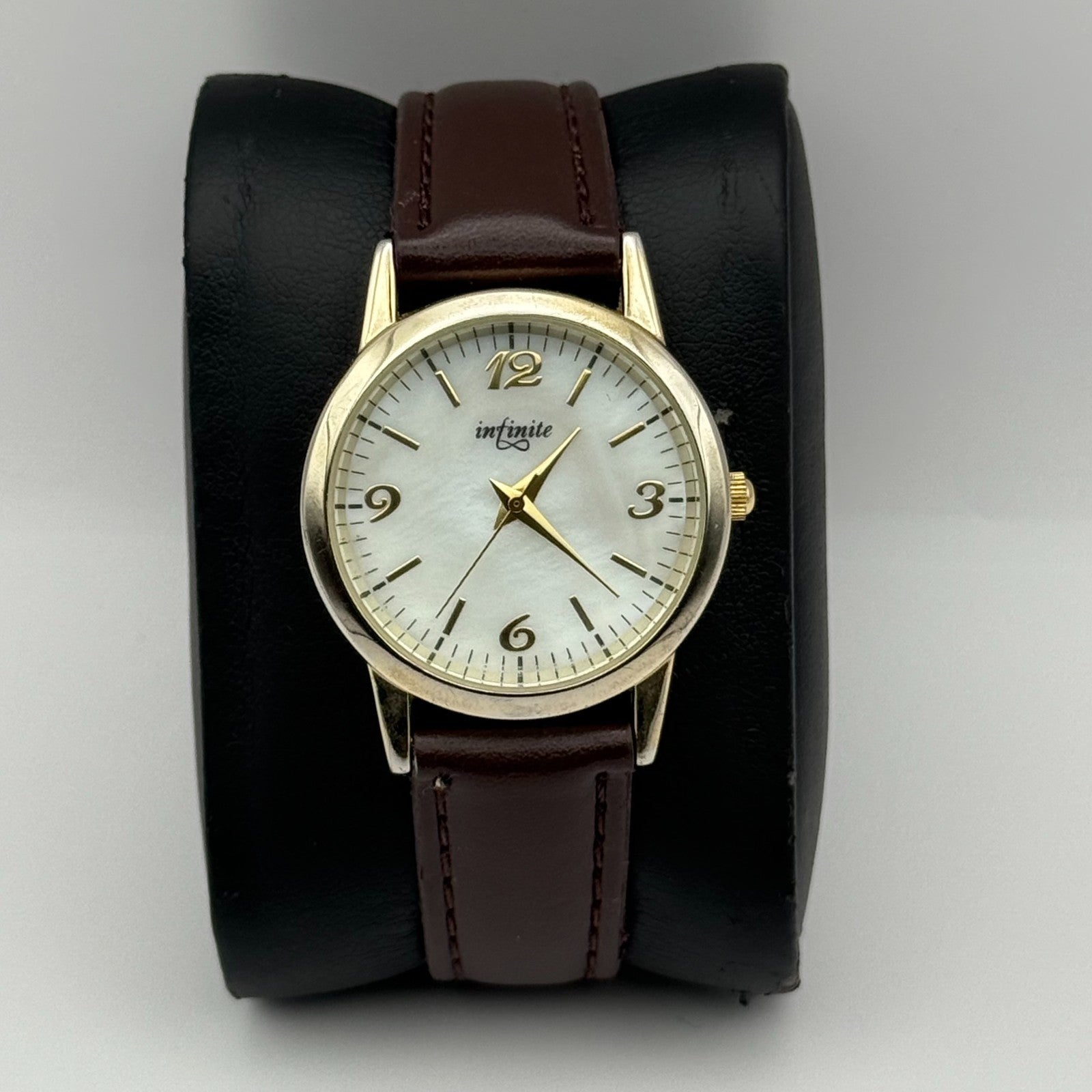 Infinite Ladies Quartz Watch Mother of Pearl Dial Brown Strap Japan Working 31mm