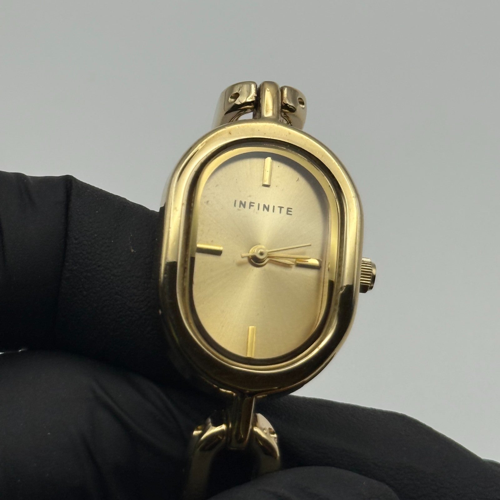 Infinite Ladies Quartz Watch Oval Dial Gold Tone Bracelet Japan Working 19mm