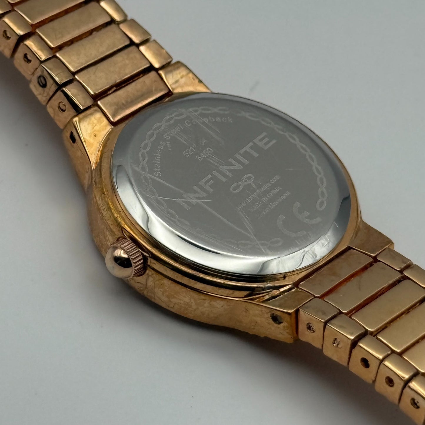 Infinite Ladies Quartz Watch Gold Tone Crystal Accents Bracelet Working 25mm