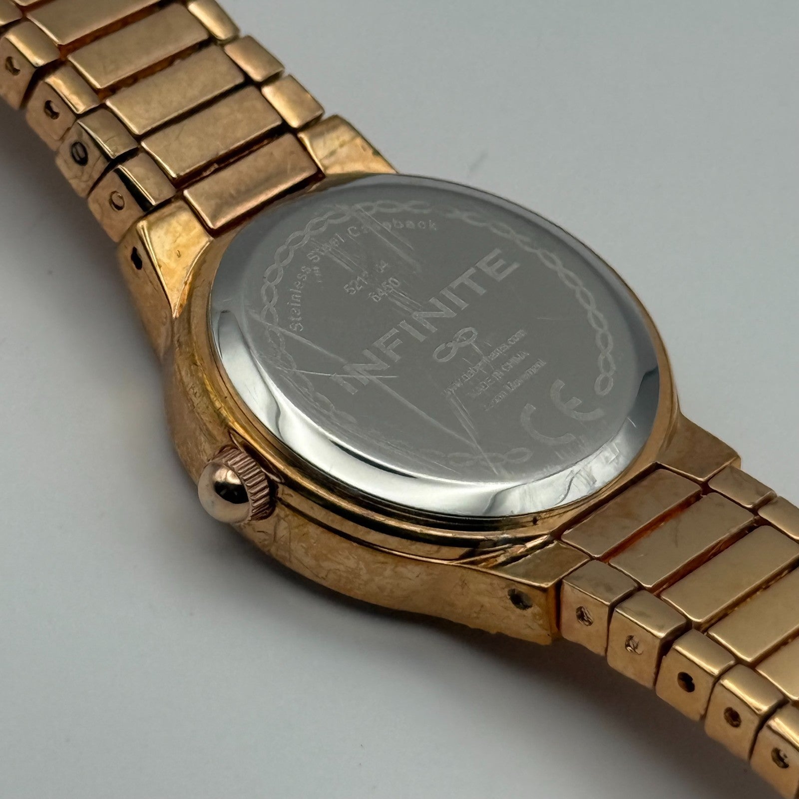 Infinite Ladies Quartz Watch Gold Tone Crystal Accents Bracelet Working 25mm