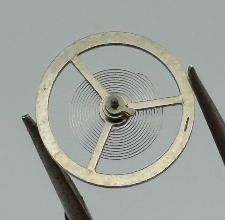 BFG 866 Balance Wheel Complete And Spring  DGT.  64 Watch Movement Parts NOS