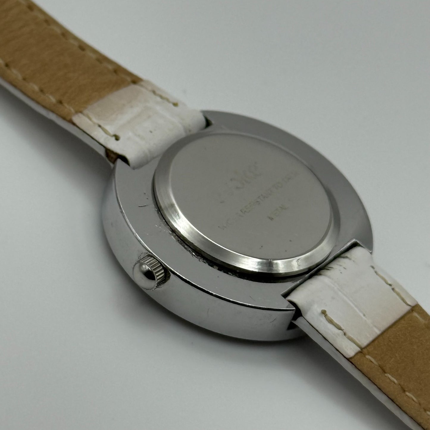 Evoke Ladies Quartz Watch Silver Dial Glitter Bezel White Strap Working 30mm