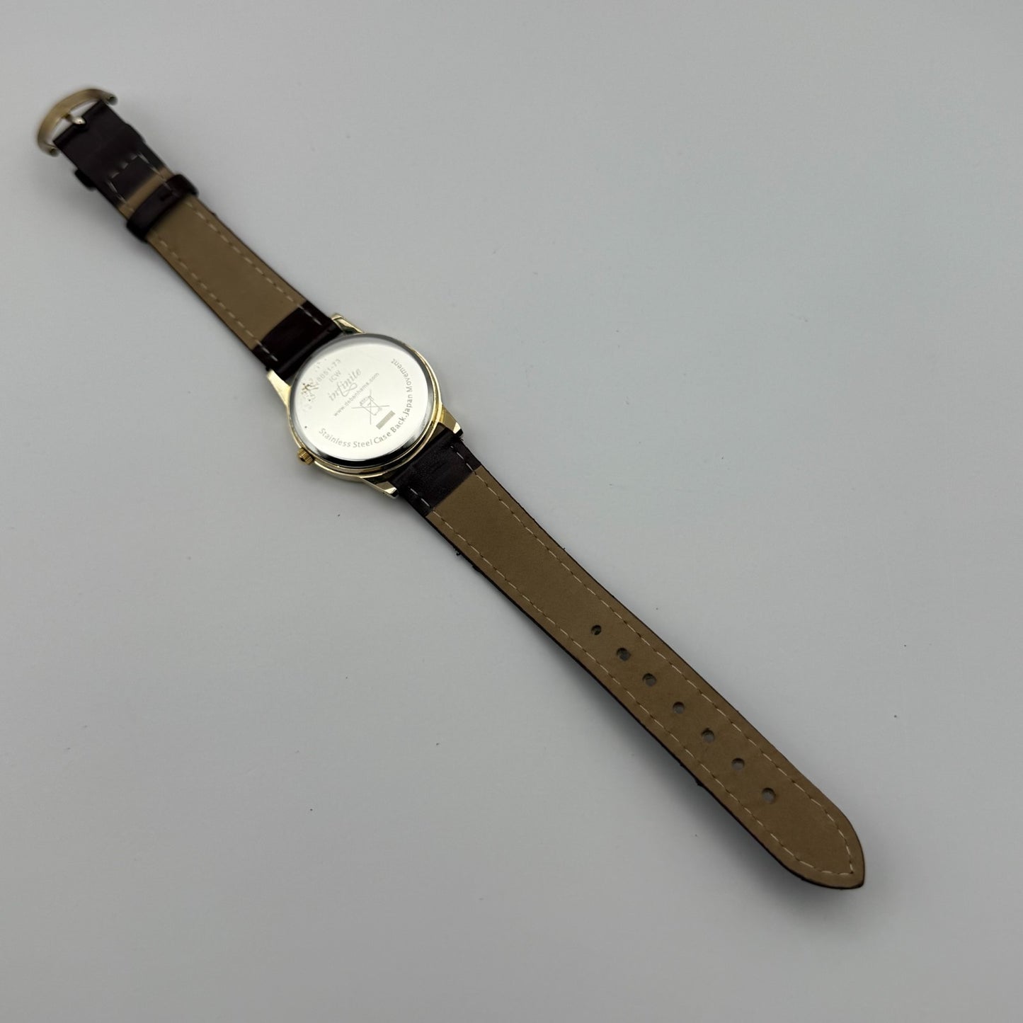 Infinite Ladies Quartz Watch Mother of Pearl Dial Brown Strap Japan Working 31mm