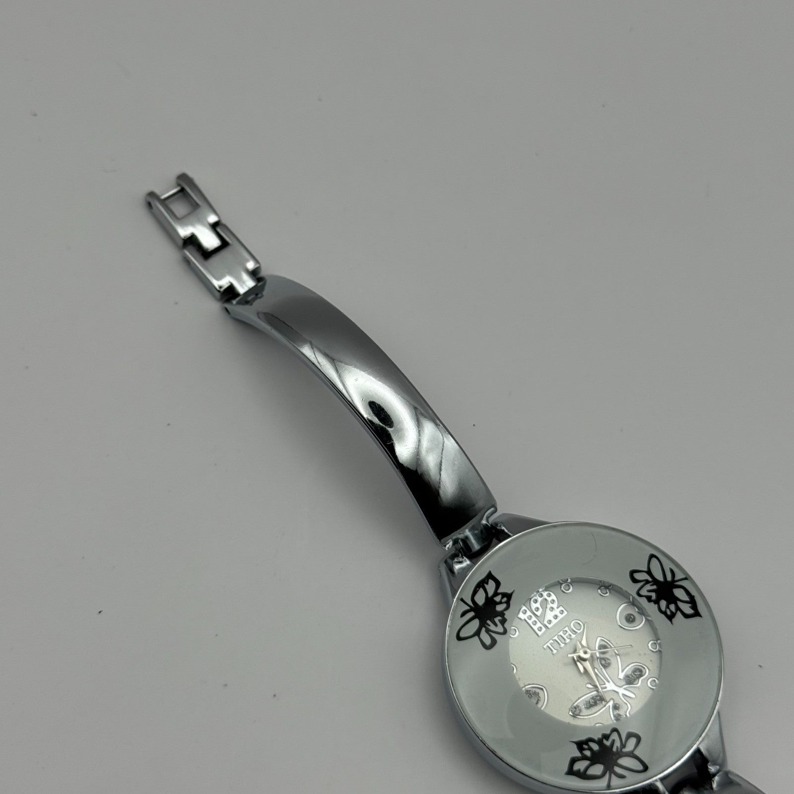 Tiho Ladies Quartz Watch Butterfly Design Dial Silver Tone Bracelet Working 30mm