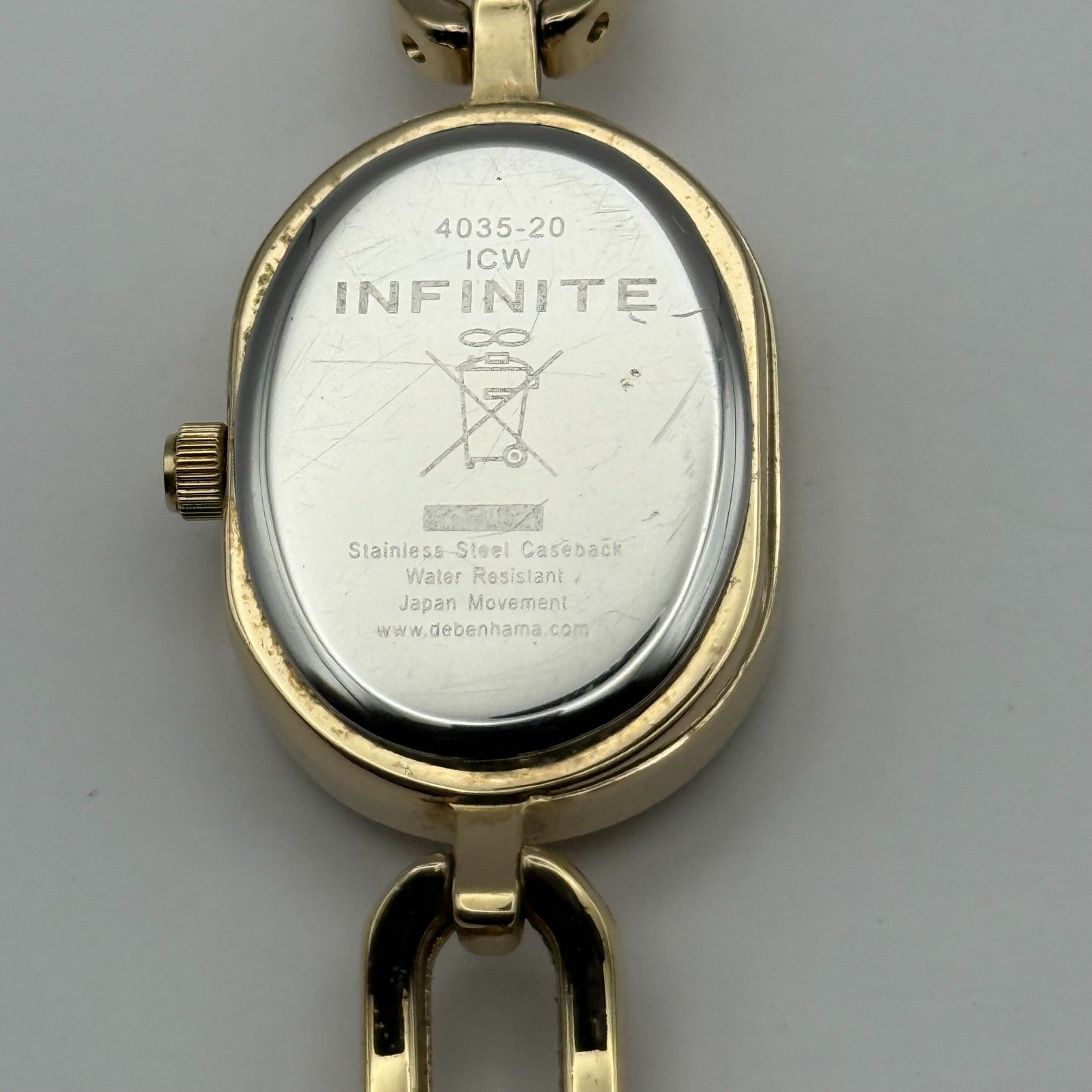 Infinite Ladies Quartz Watch Oval Dial Gold Tone Bracelet Japan Working 19mm