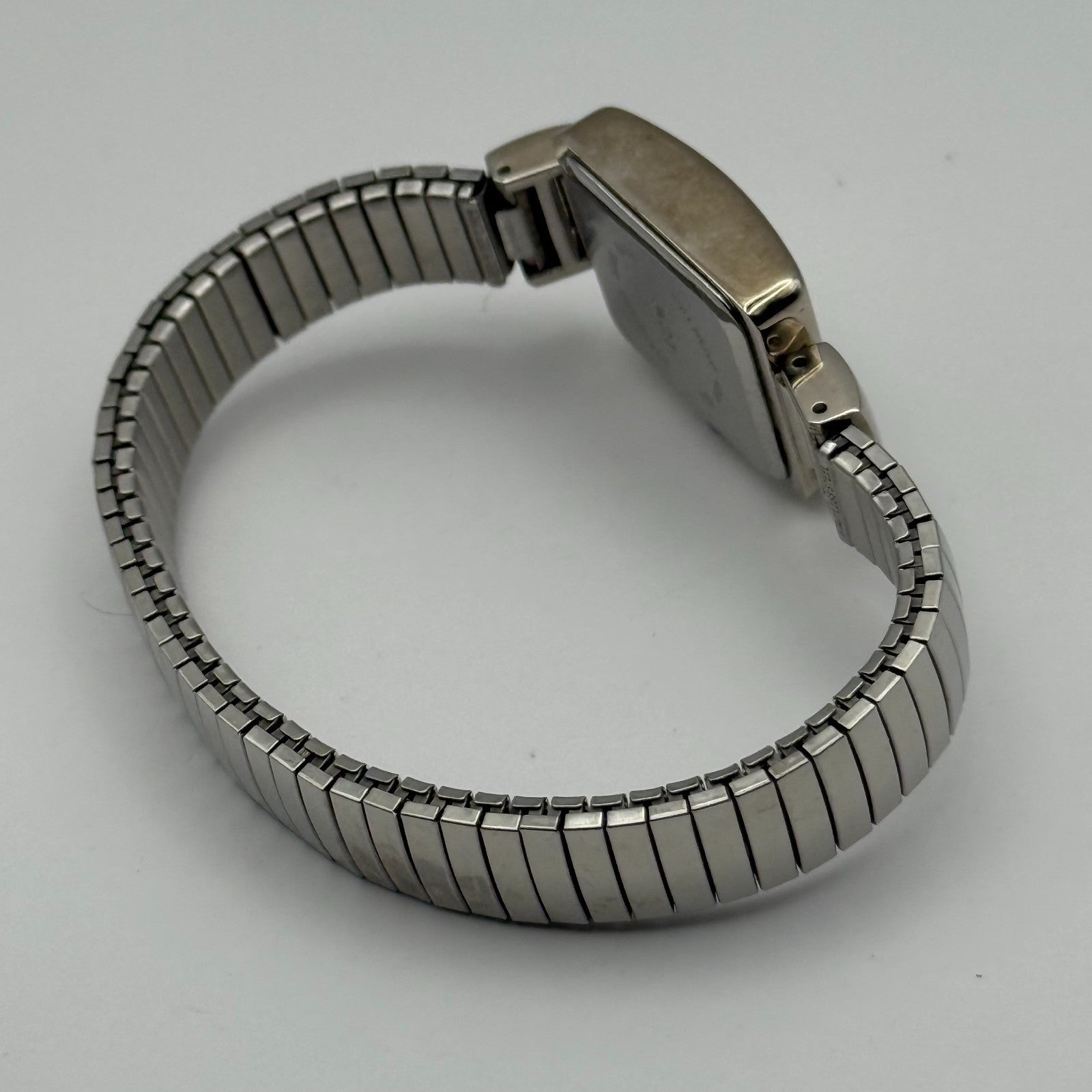 A Ladies Quartz Watch Rectangular Dial Silver Tone Stretch Band Working 19mm