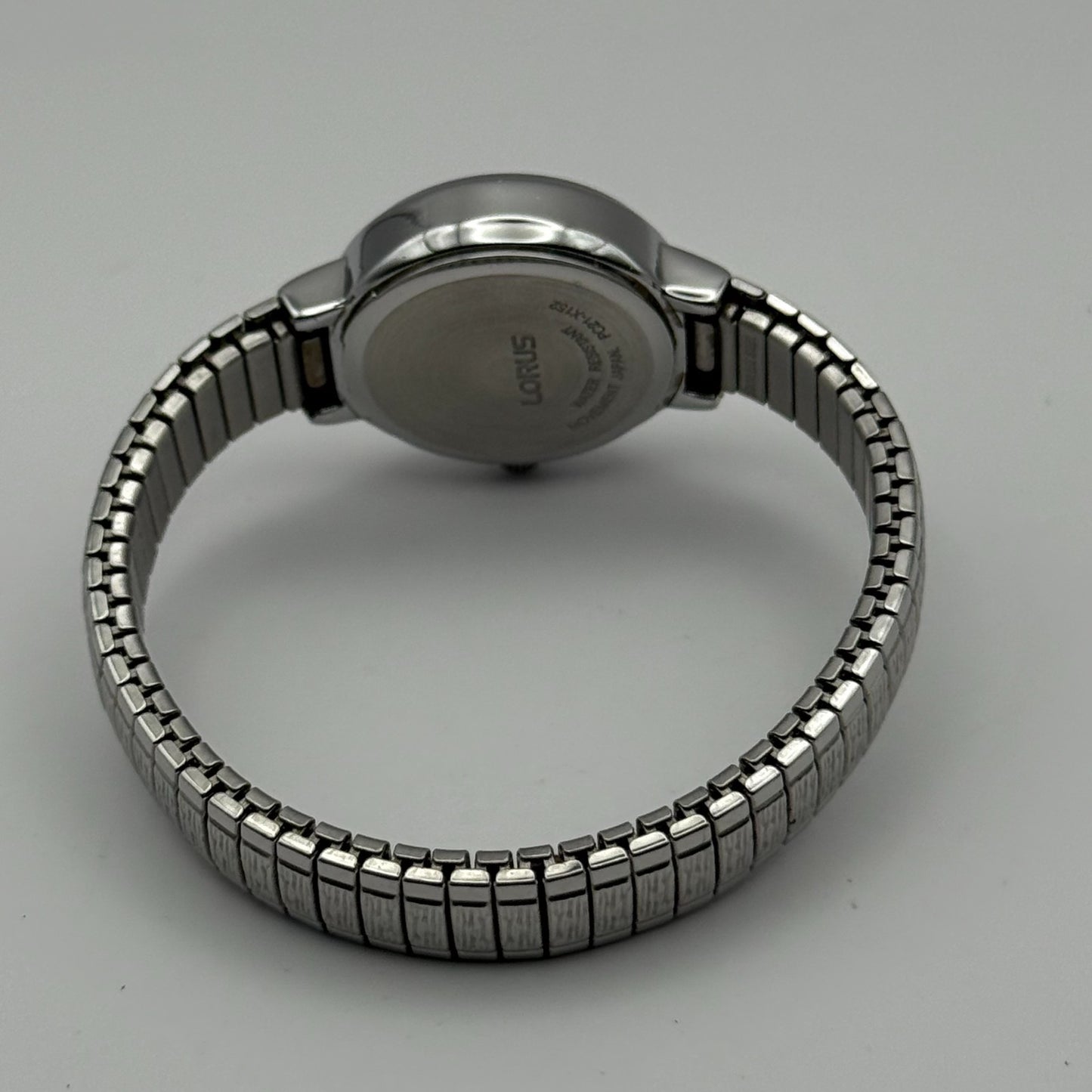 Lorus Ladies Quartz Watch White Dial Silver Tone Stretch Band Japan Working 23mm