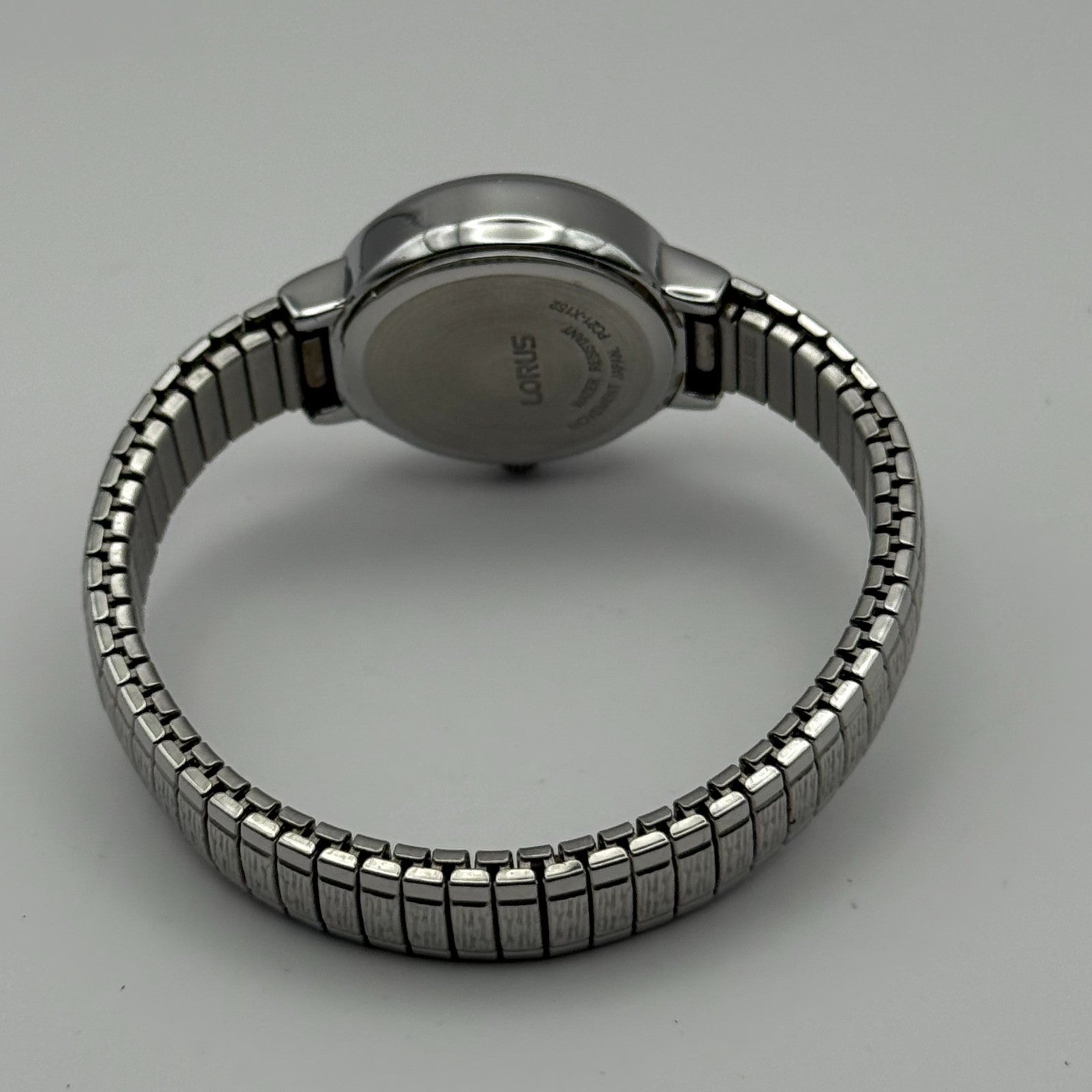 Lorus Ladies Quartz Watch White Dial Silver Tone Stretch Band Japan Working 23mm