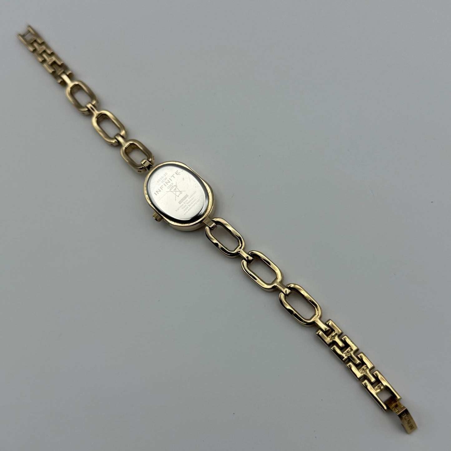 Infinite Ladies Quartz Watch Oval Dial Gold Tone Bracelet Japan Working 19mm