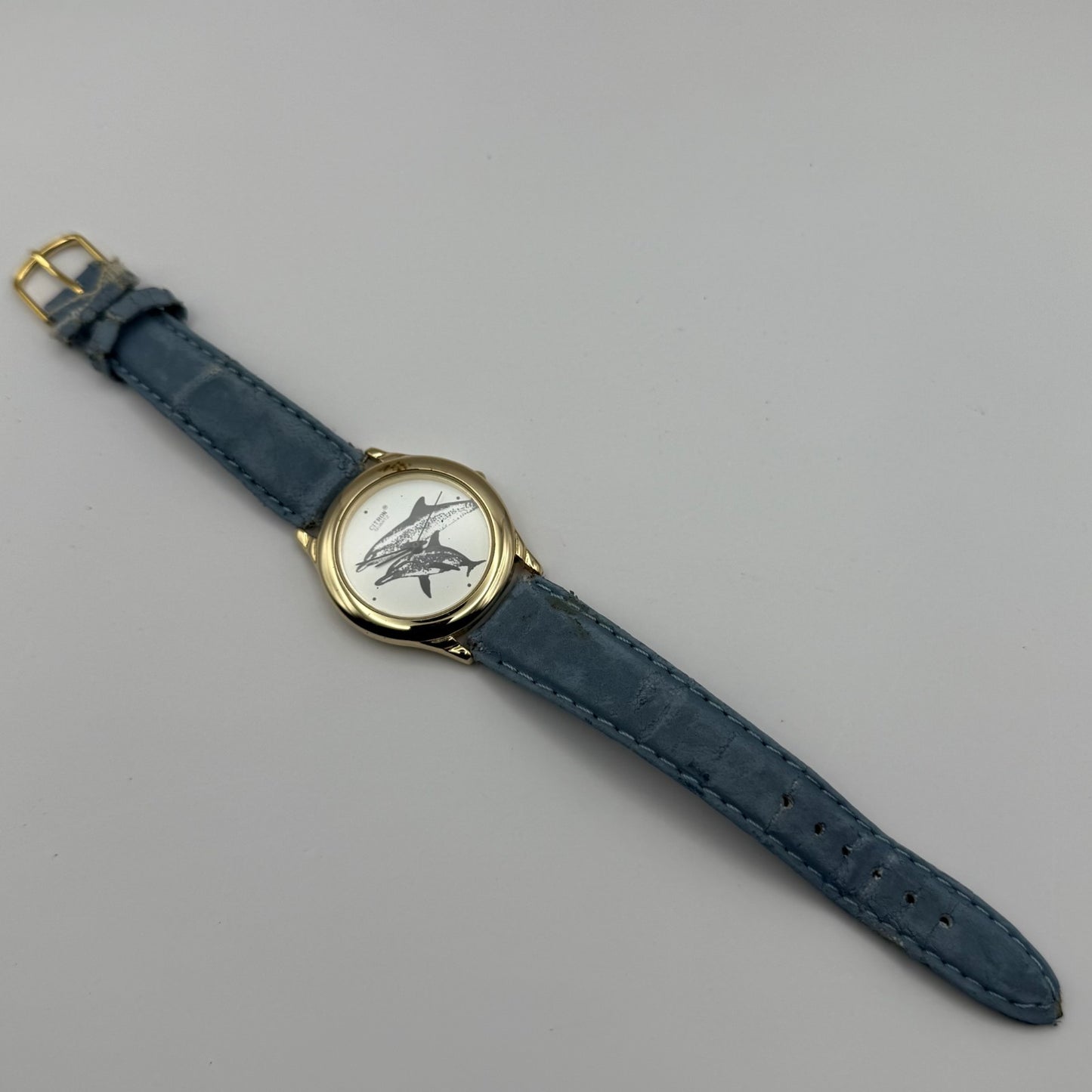 Citron Ladies Quartz Watch Dolphin Dial Gold Tone Blue Strap Working 35mm