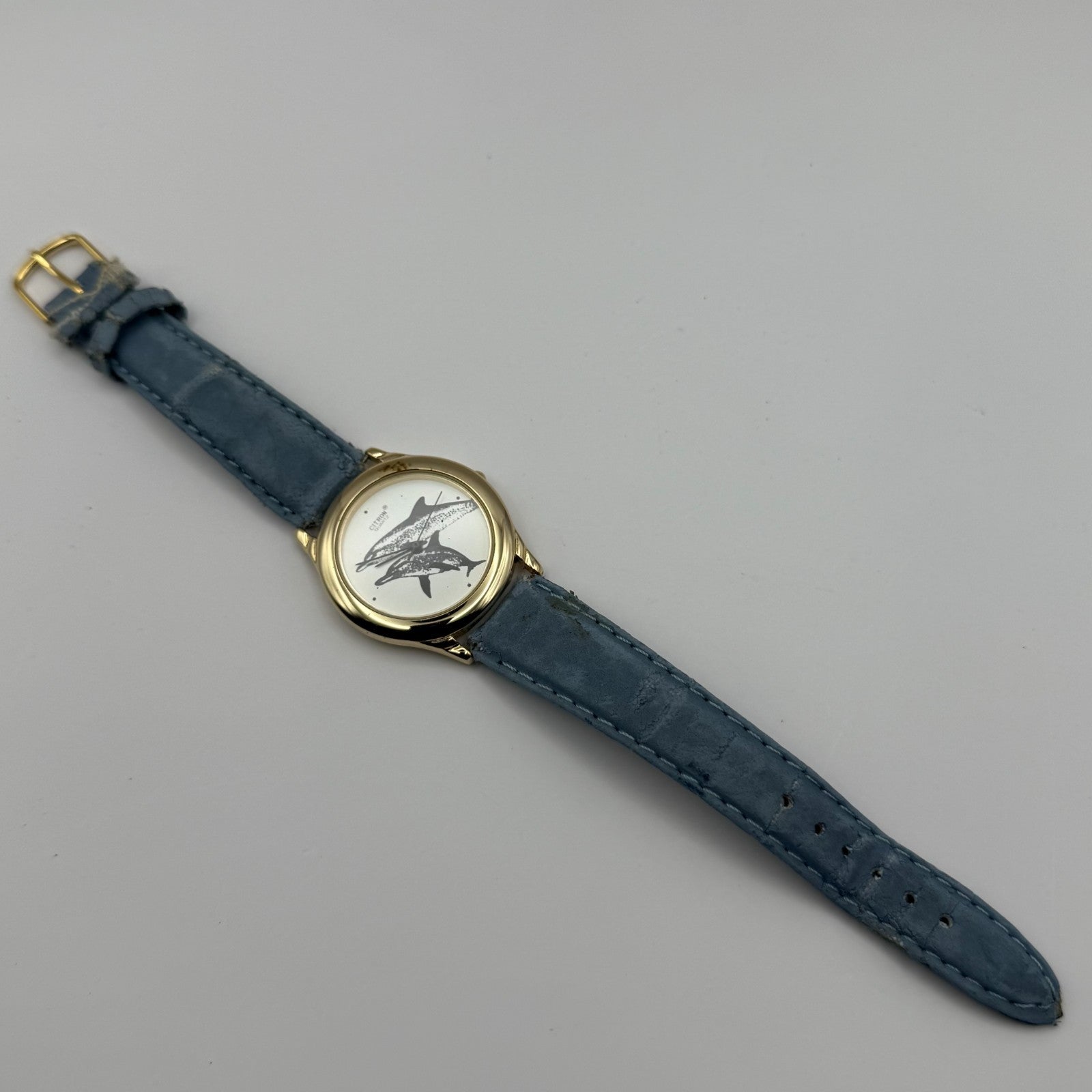 Citron Ladies Quartz Watch Dolphin Dial Gold Tone Blue Strap Working 35mm