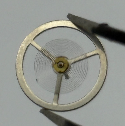 BFG 866 Balance Wheel Complete And Spring  DGT.  64 Watch Movement Parts NOS