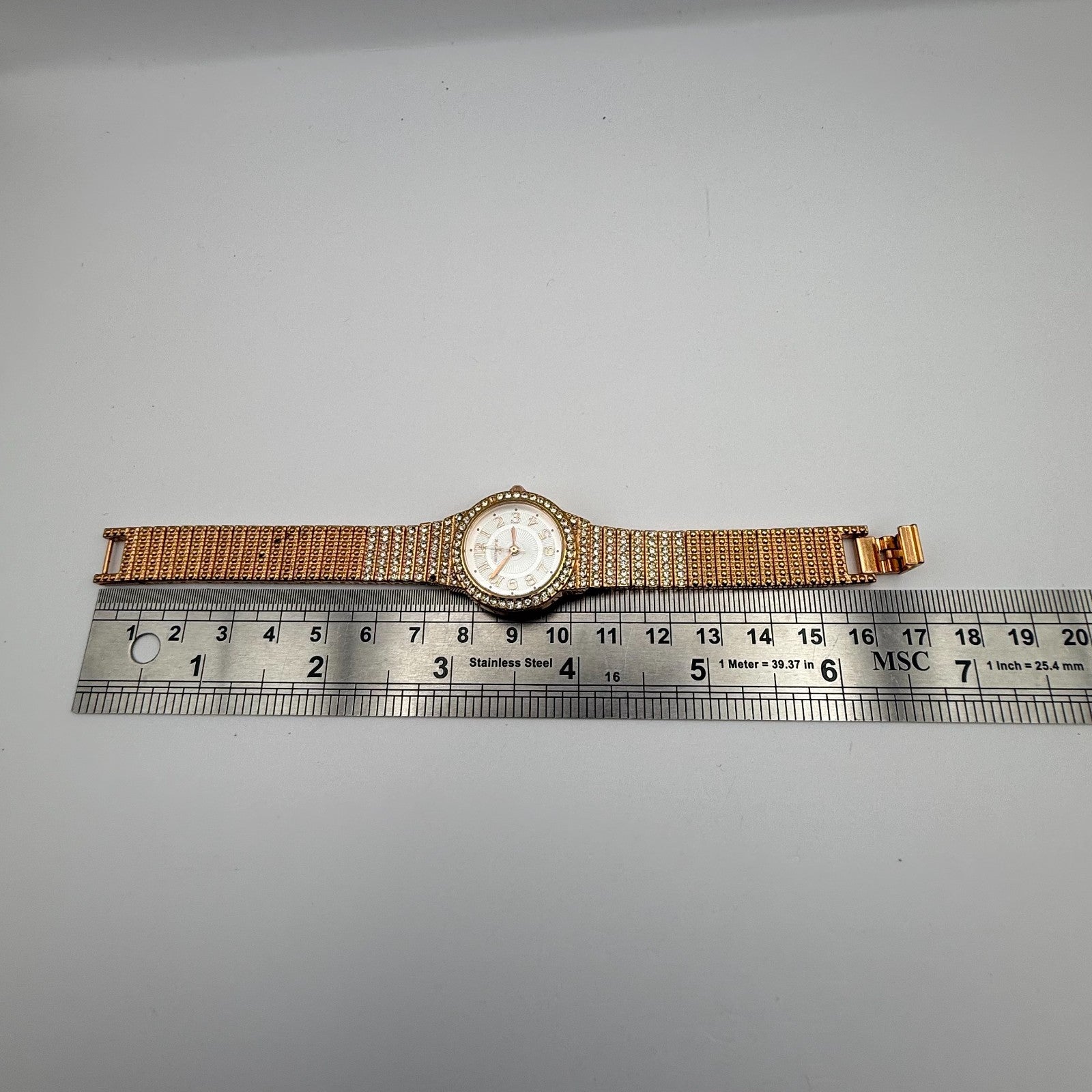 Infinite Ladies Quartz Watch Gold Tone Crystal Accents Bracelet Working 25mm