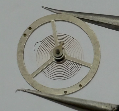 BFG 866 Balance Wheel Complete And Spring  DGT. 64 Watch Movement Parts NOS