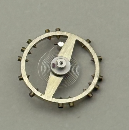 FHF 34 Balance Wheel Complete And Spring  7¾’’’ 1047 M Watch Movement Parts NOS