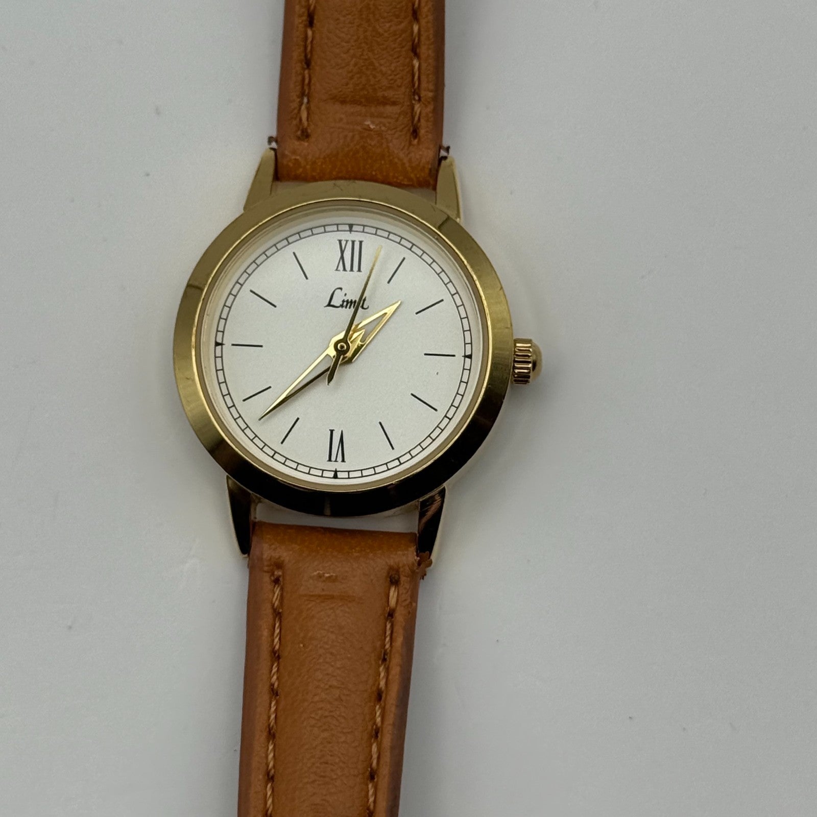 Limit Ladies Quartz Watch White Dial Gold Tone Case Brown Strap Working 25mm