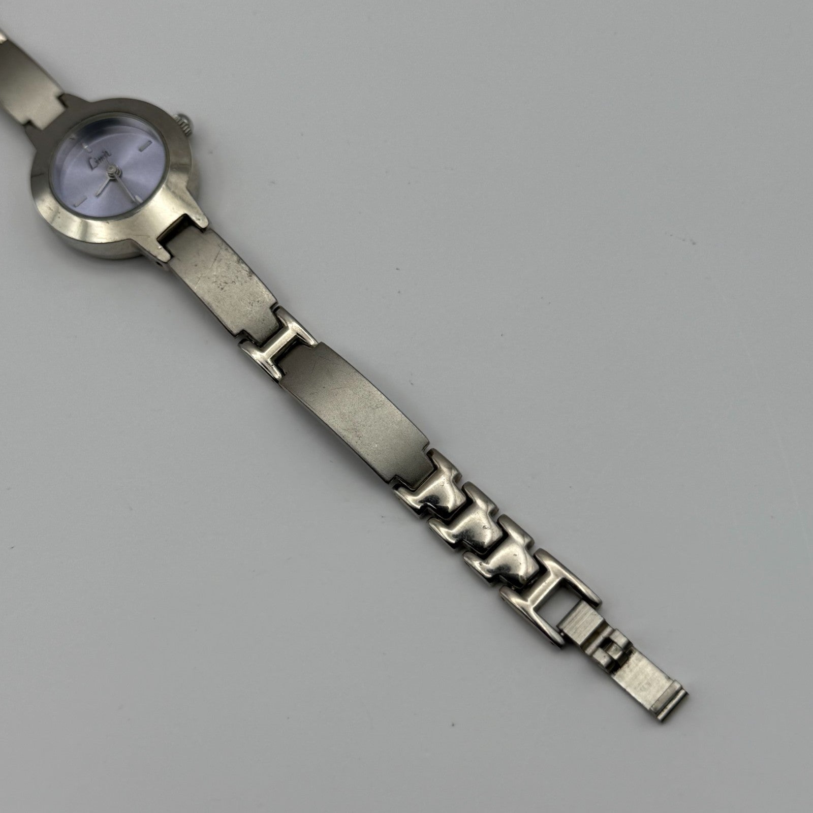 Limit Ladies Quartz Watch Purple Dial Silver Tone Bracelet Steel Working 21mm