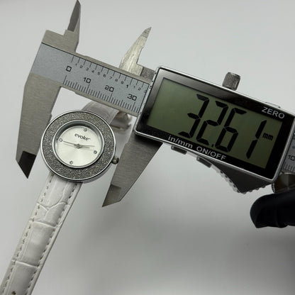 Evoke Ladies Quartz Watch Silver Dial Glitter Bezel White Strap Working 30mm