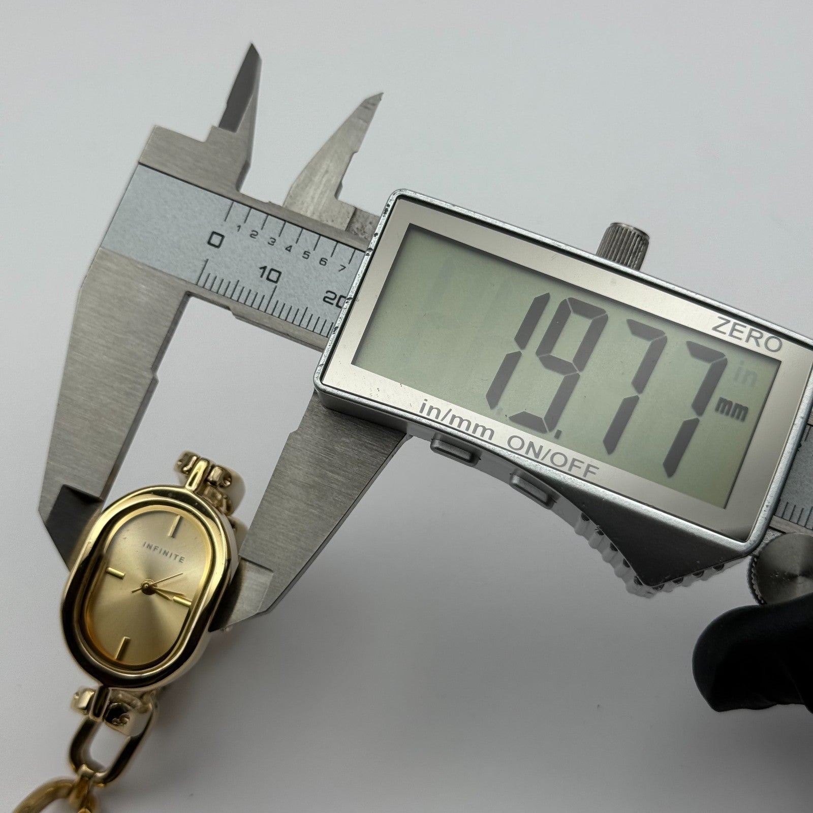 Infinite Ladies Quartz Watch Oval Dial Gold Tone Bracelet Japan Working 19mm