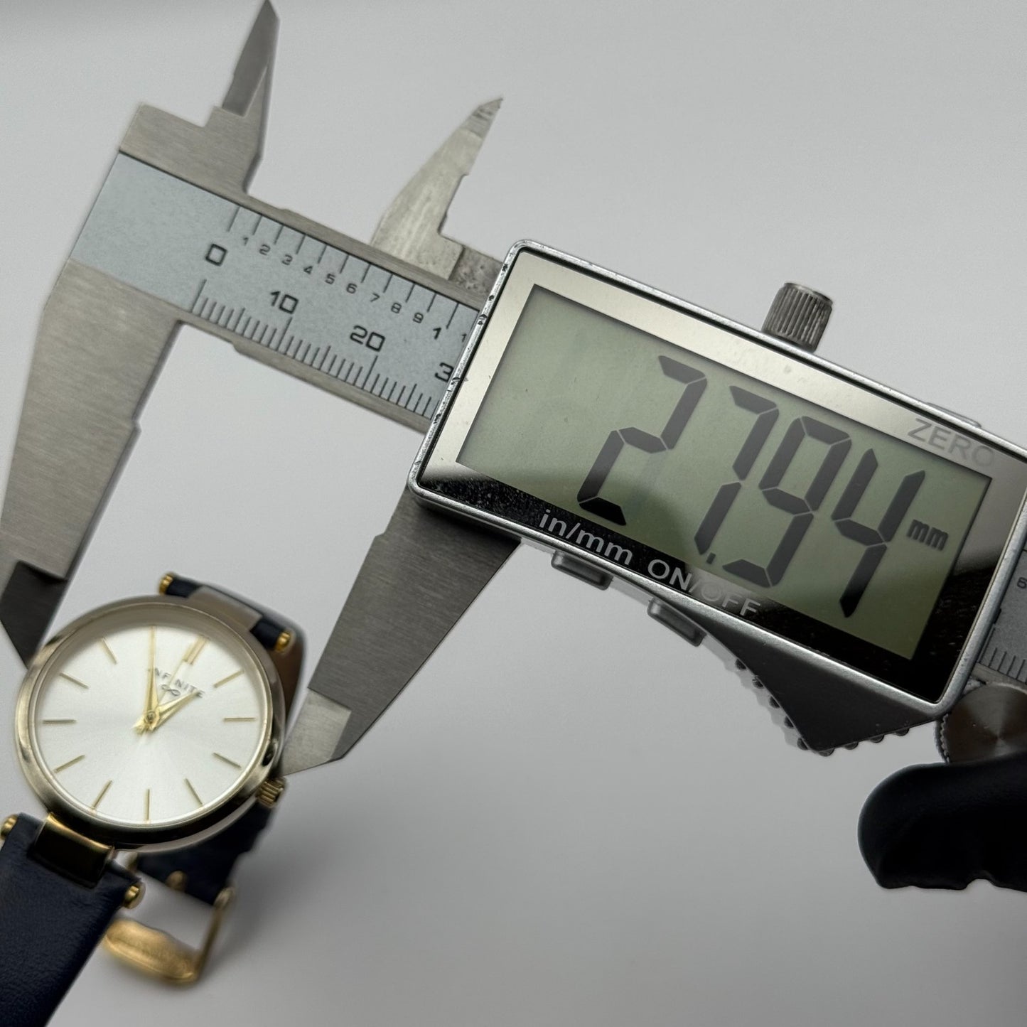 Infinite Ladies Quartz Watch Silver Dial Blue Leather Strap Japan Working 28mm