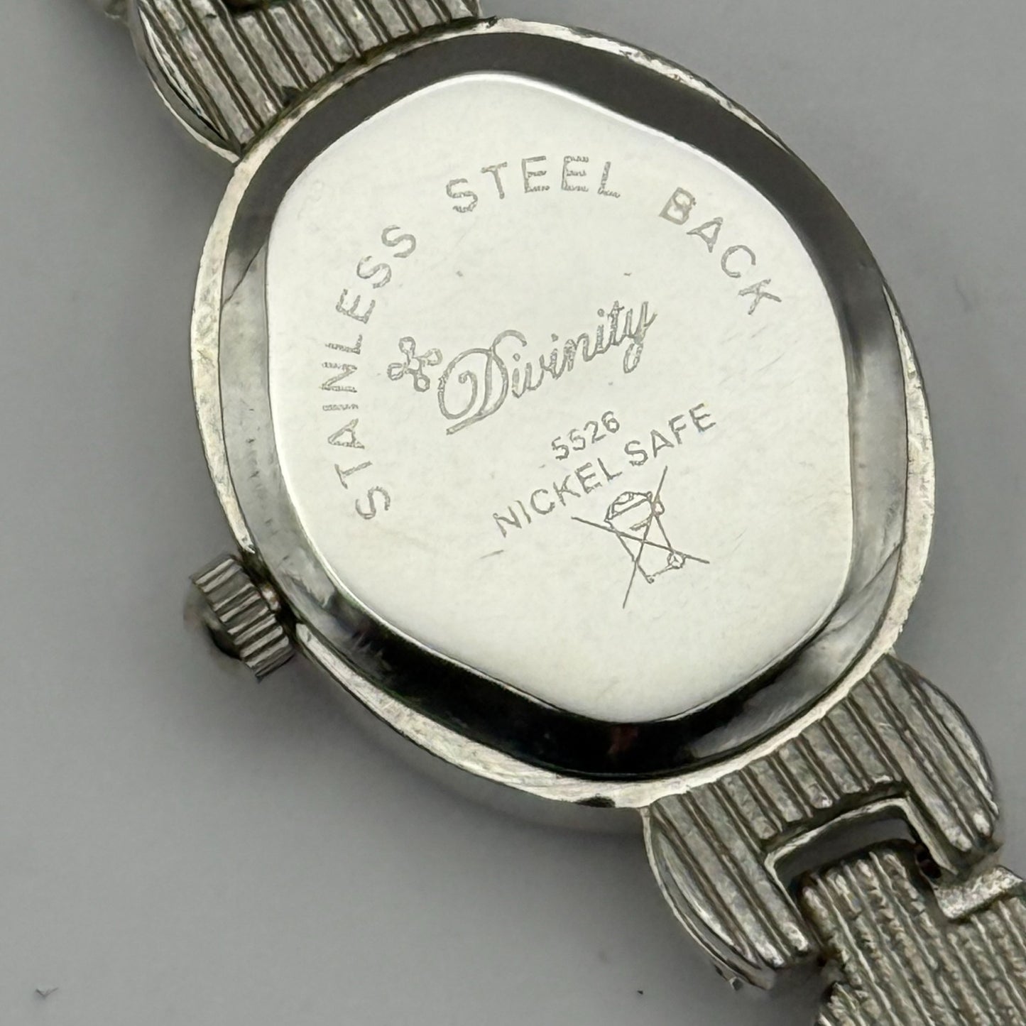 Divinity Ladies Quartz Watch Oval Dial Silver Tone Bracelet Working 19mm