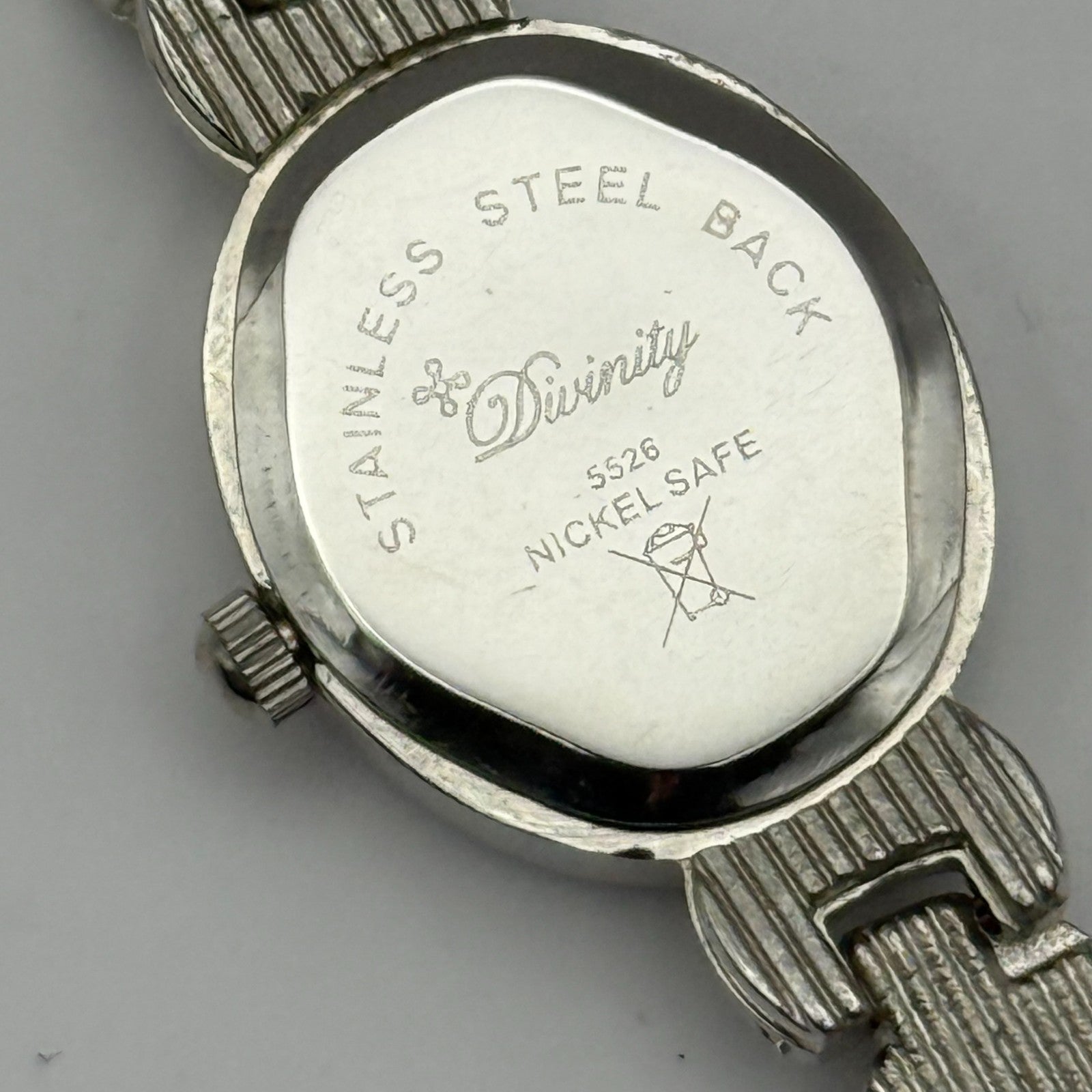 Divinity Ladies Quartz Watch Oval Dial Silver Tone Bracelet Working 19mm