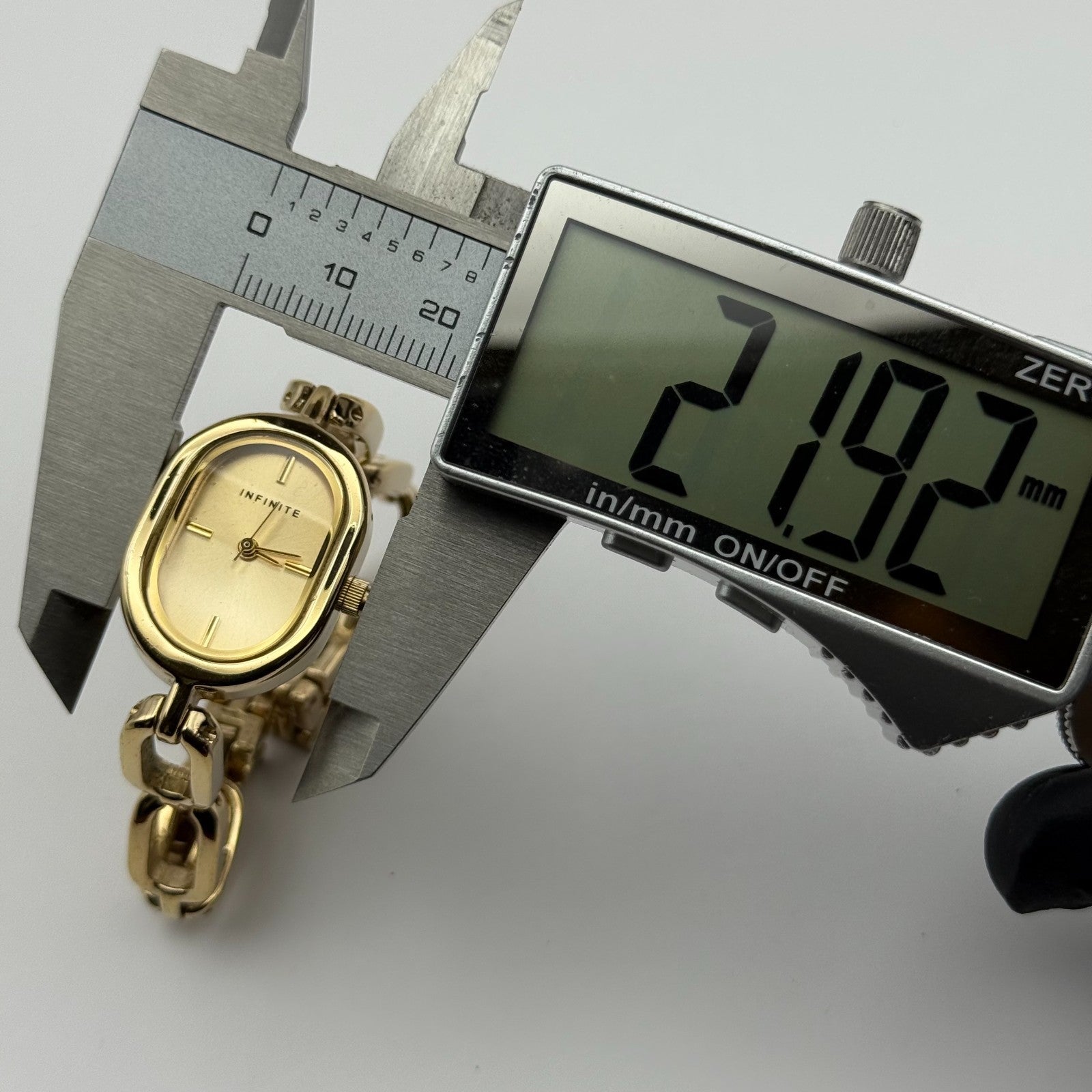 Infinite Ladies Quartz Watch Oval Dial Gold Tone Bracelet Japan Working 19mm