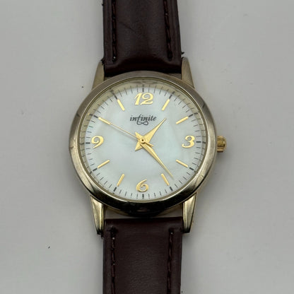 Infinite Ladies Quartz Watch Mother of Pearl Dial Brown Strap Japan Working 31mm