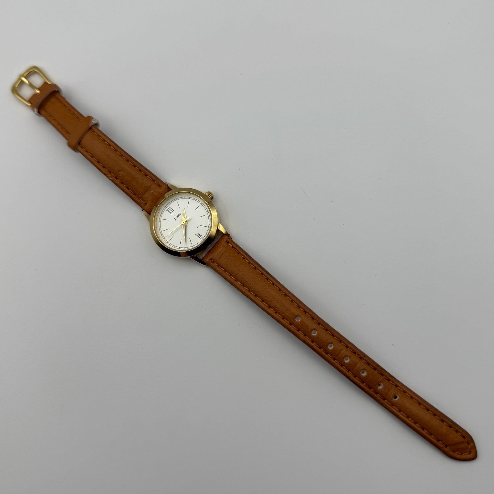 Limit Ladies Quartz Watch White Dial Gold Tone Case Brown Strap Working 25mm