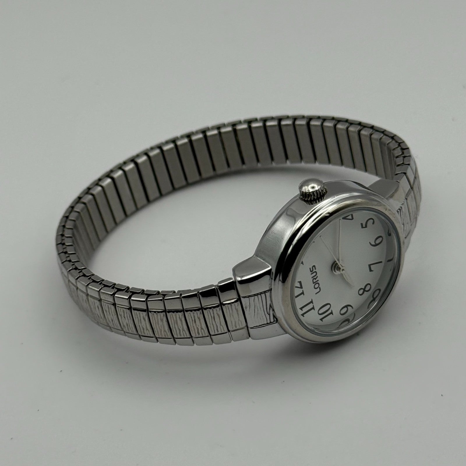 Lorus Ladies Quartz Watch White Dial Silver Tone Stretch Band Japan Working 23mm