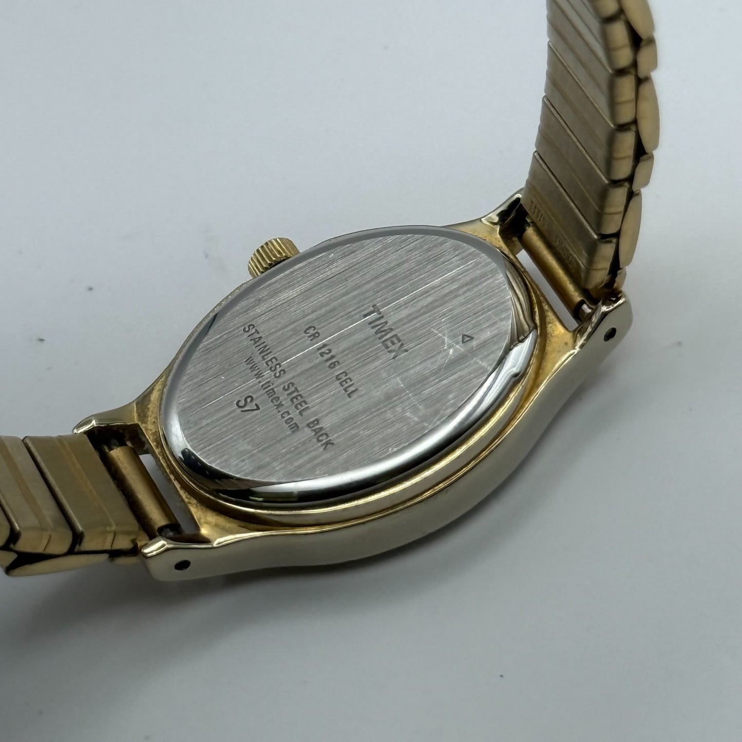 Timex Ladies Quartz Watch Oval Dial Gold Tone Stretch Band Steel Working 21mm