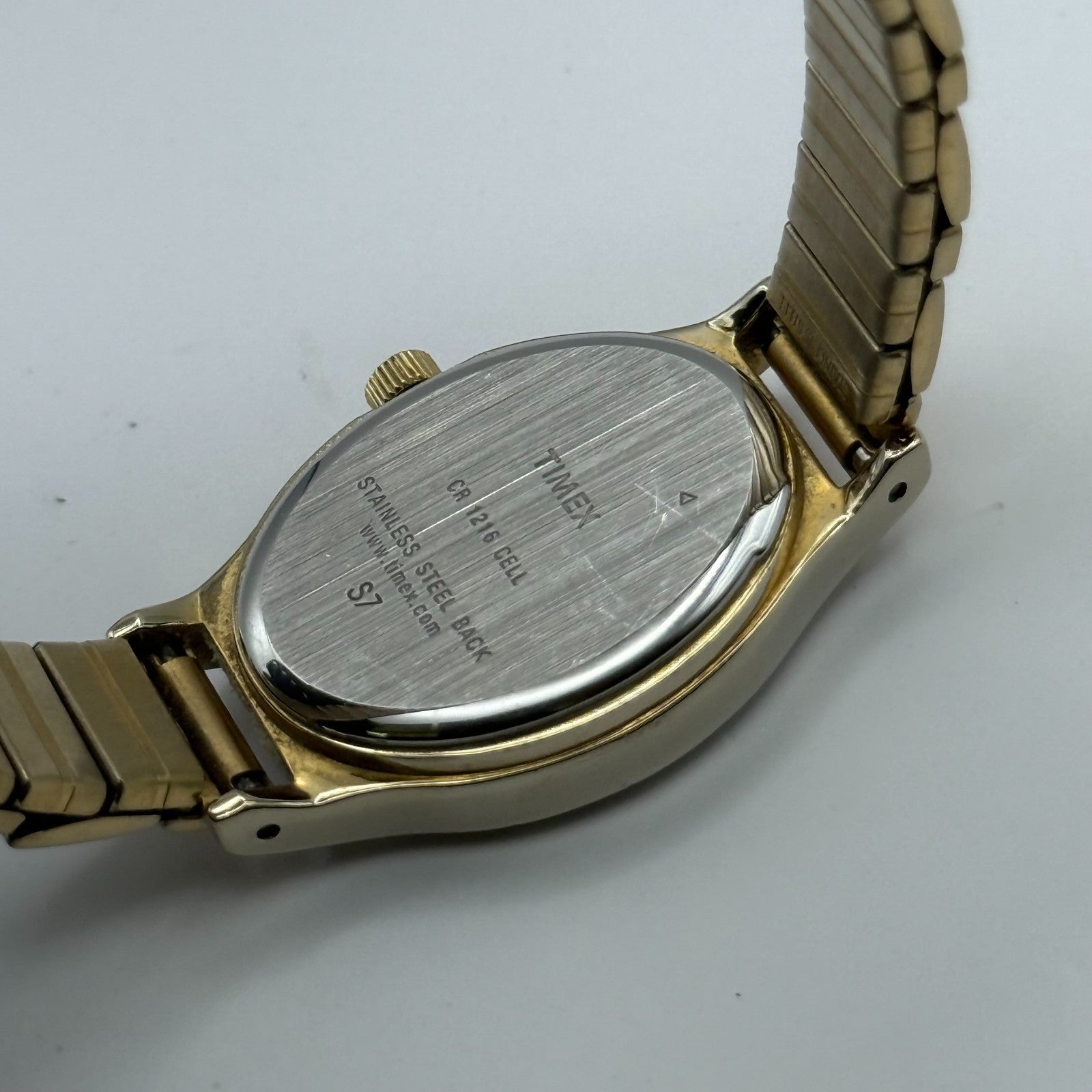 Timex Ladies Quartz Watch Oval Dial Gold Tone Stretch Band Steel Working 21mm