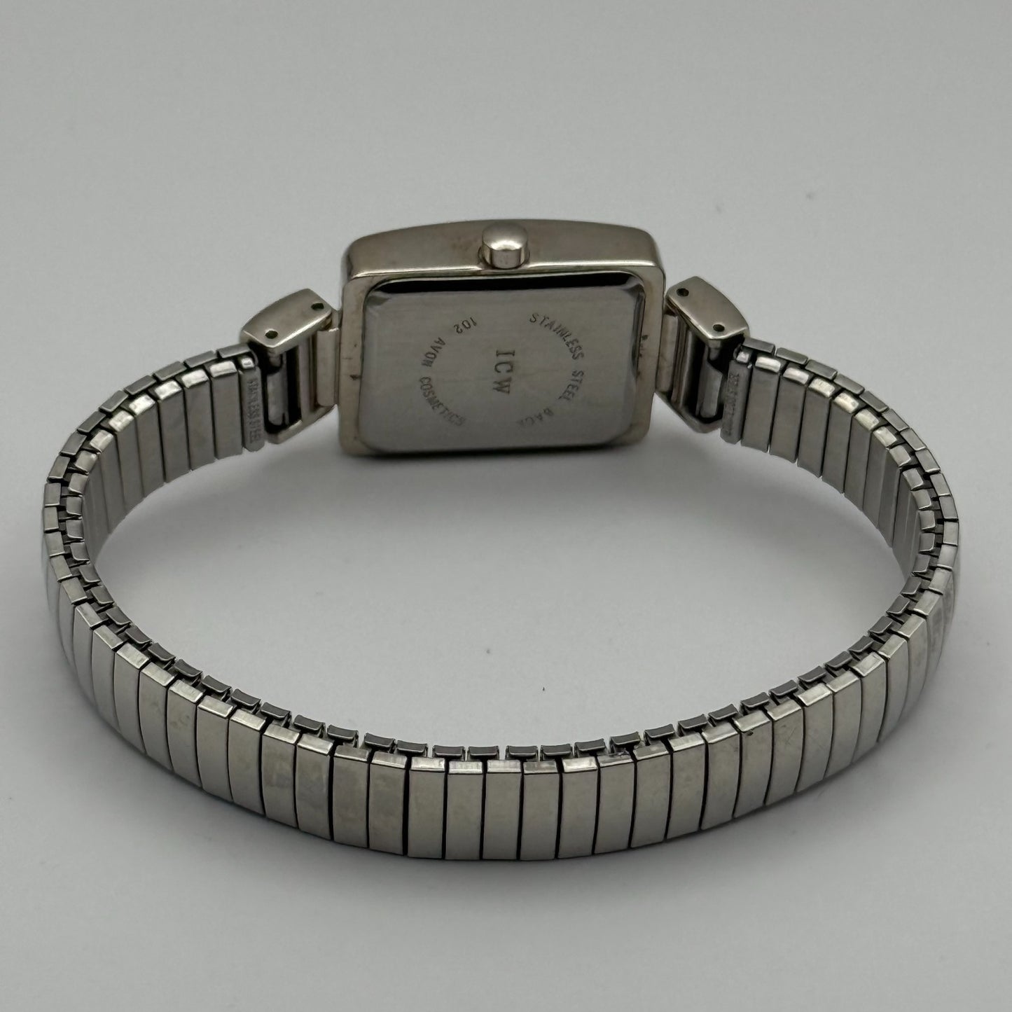 A Ladies Quartz Watch Rectangular Dial Silver Tone Stretch Band Working 19mm