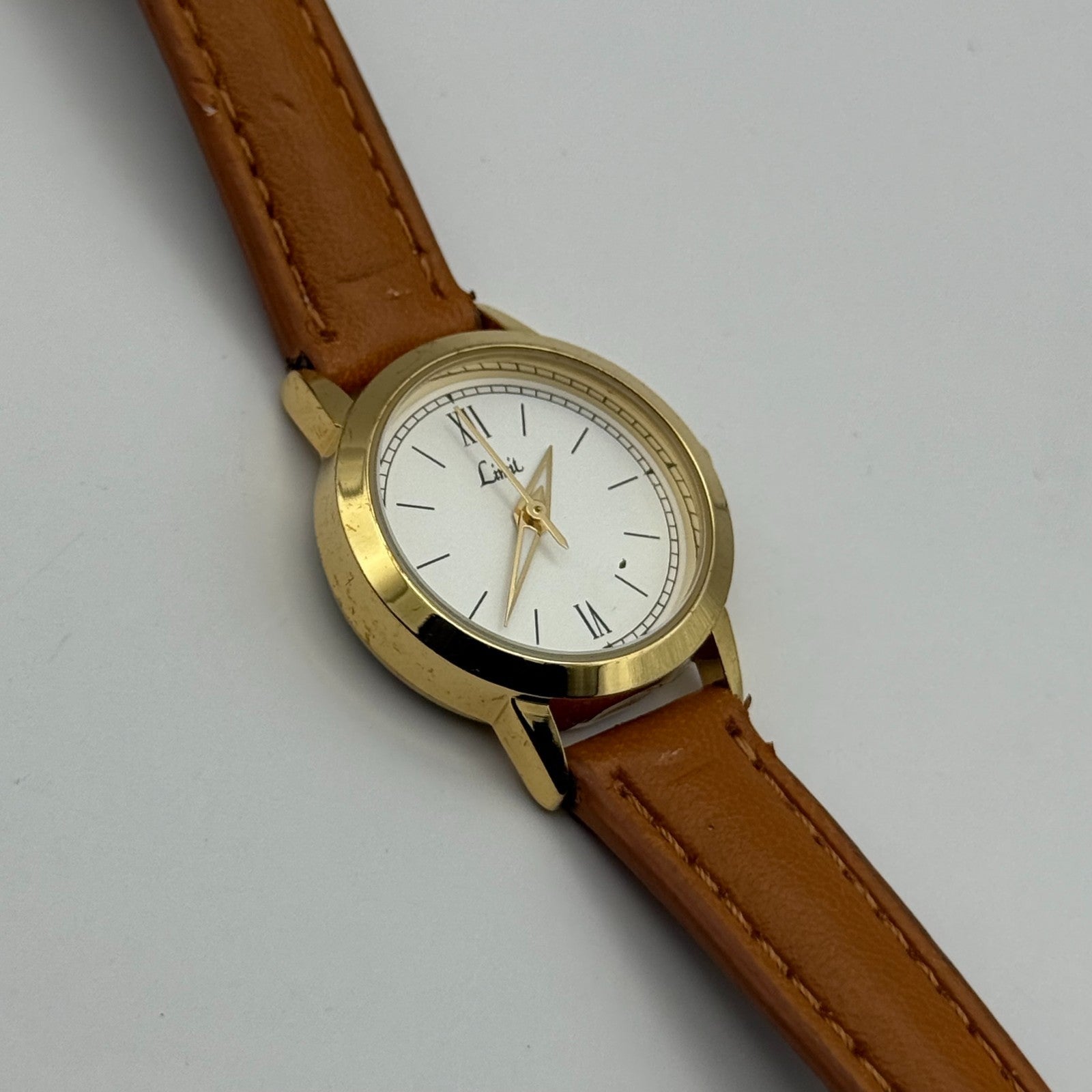 Limit Ladies Quartz Watch White Dial Gold Tone Case Brown Strap Working 25mm