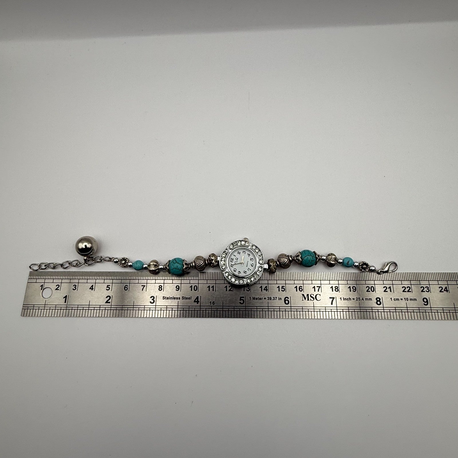 YLQ Ladies Quartz Watch Crystal Accents Beaded Design Bracelet Working 25mm