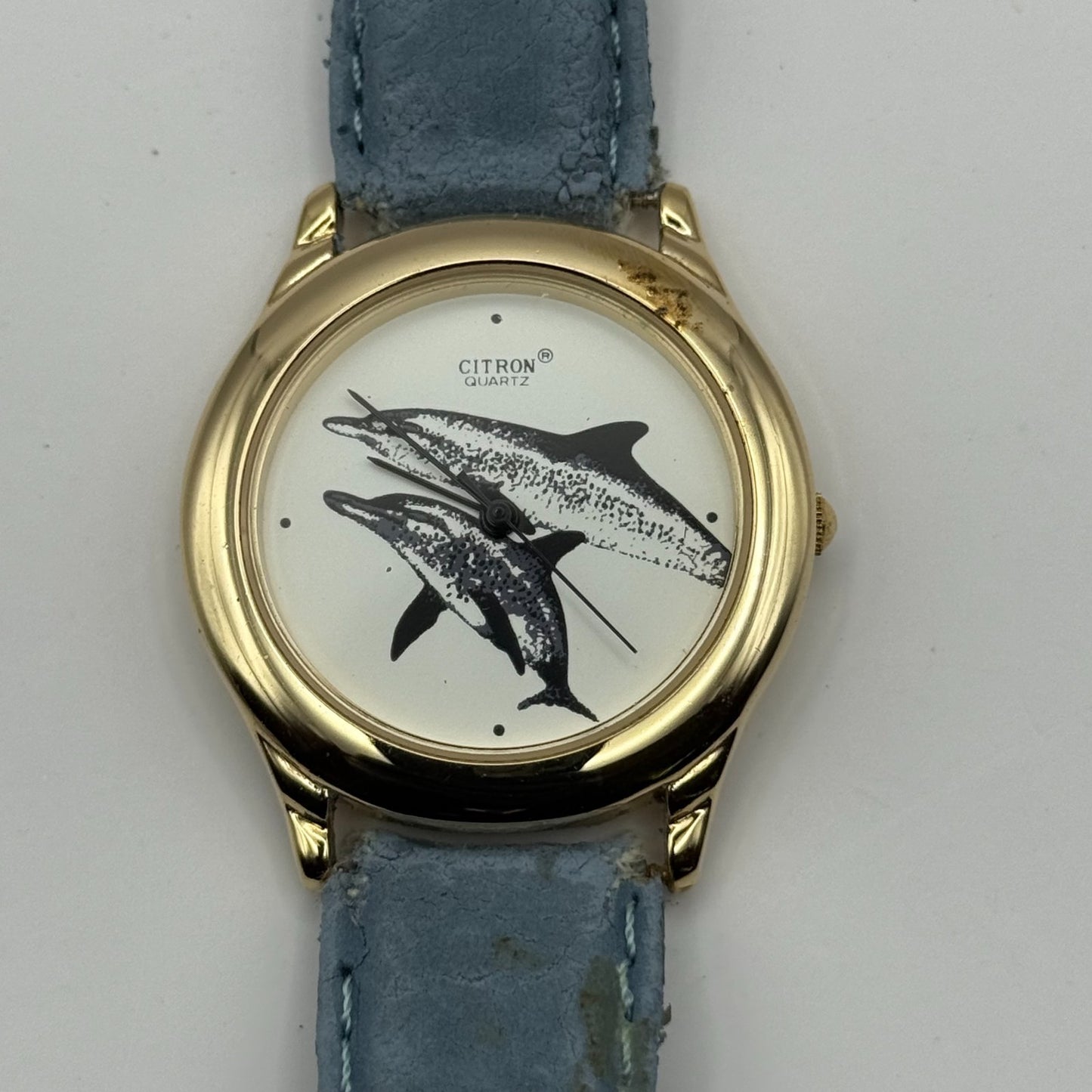 Citron Ladies Quartz Watch Dolphin Dial Gold Tone Blue Strap Working 35mm