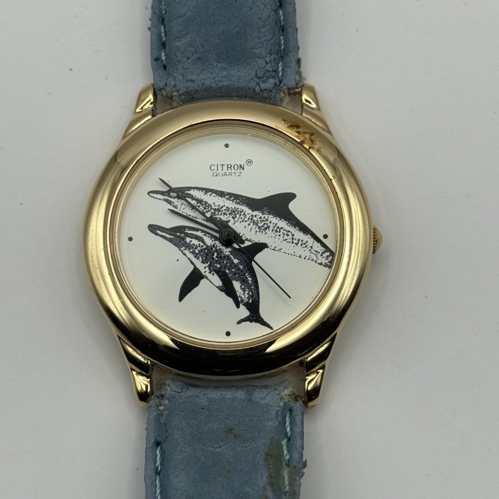 Citron Ladies Quartz Watch Dolphin Dial Gold Tone Blue Strap Working 35mm