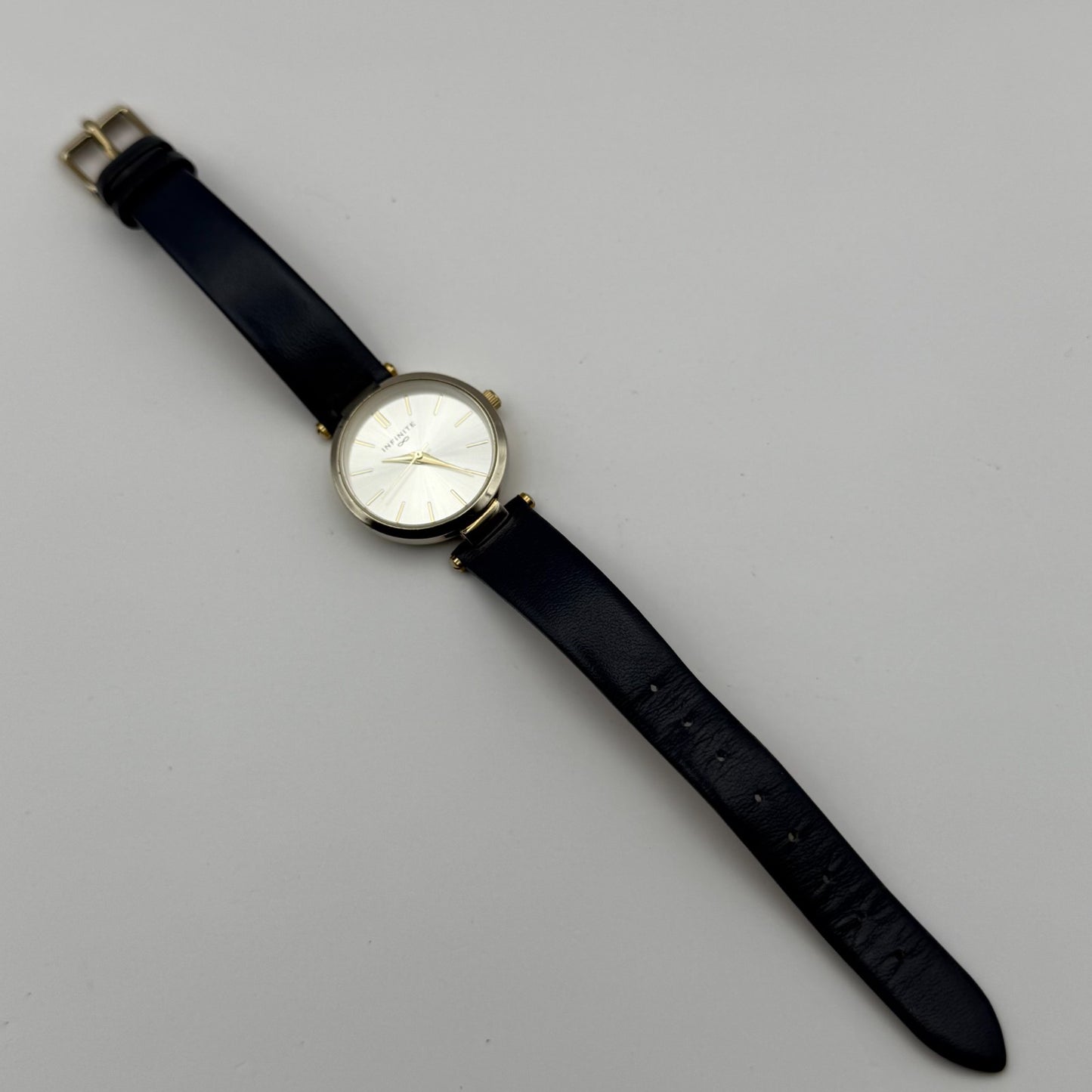 Infinite Ladies Quartz Watch Silver Dial Blue Leather Strap Japan Working 28mm