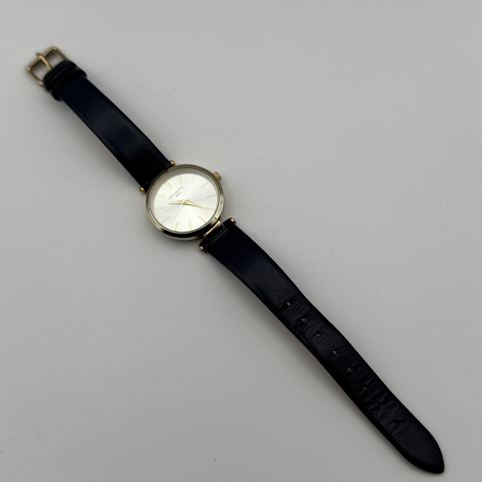 Infinite Ladies Quartz Watch Silver Dial Blue Leather Strap Japan Working 28mm