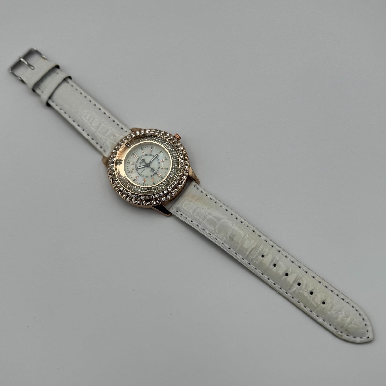 Gerryda Ladies Quartz Watch Rose Gold Crystal Accents White Strap Working 43mm